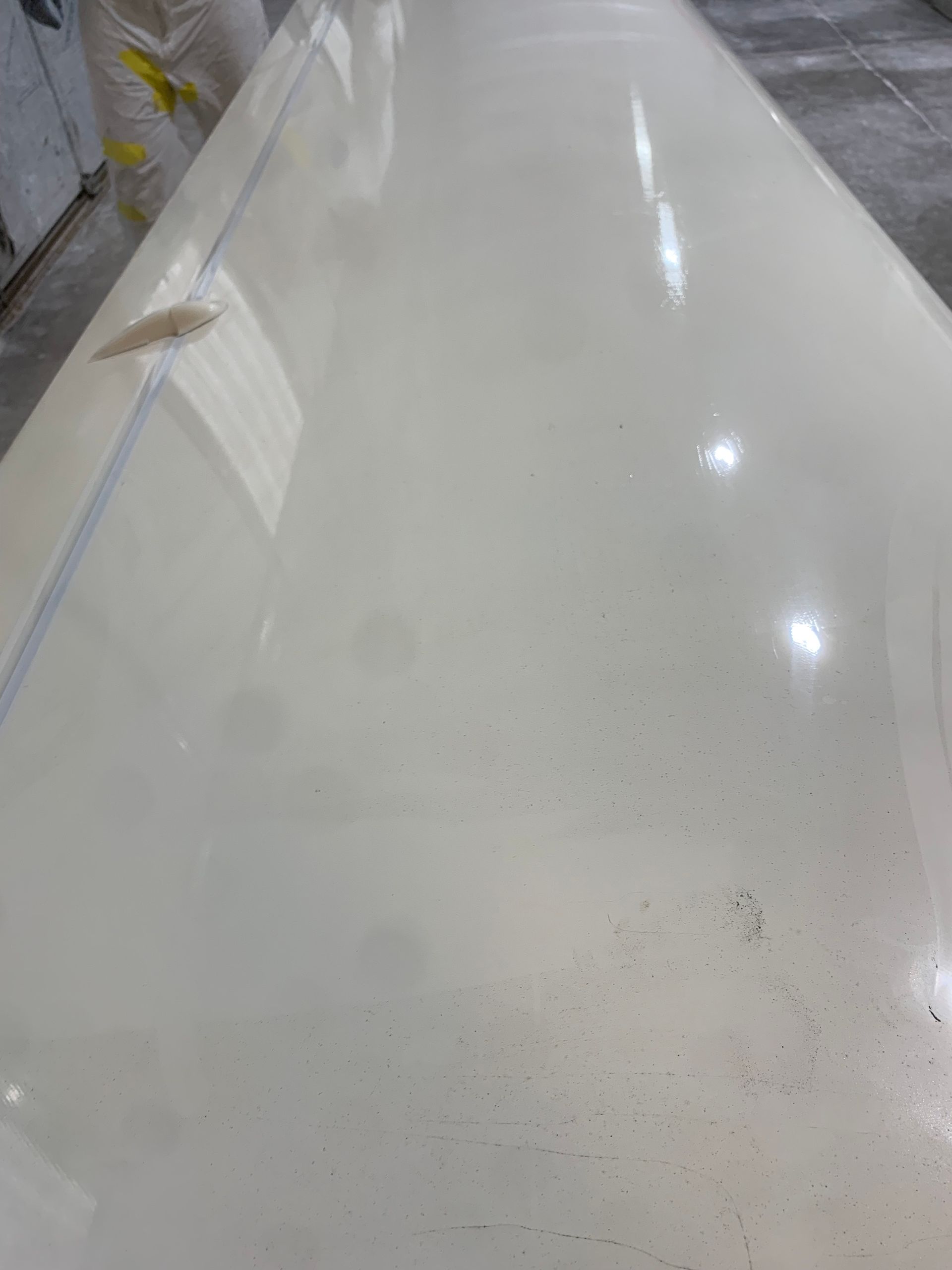 A close up of a white counter top in a room.