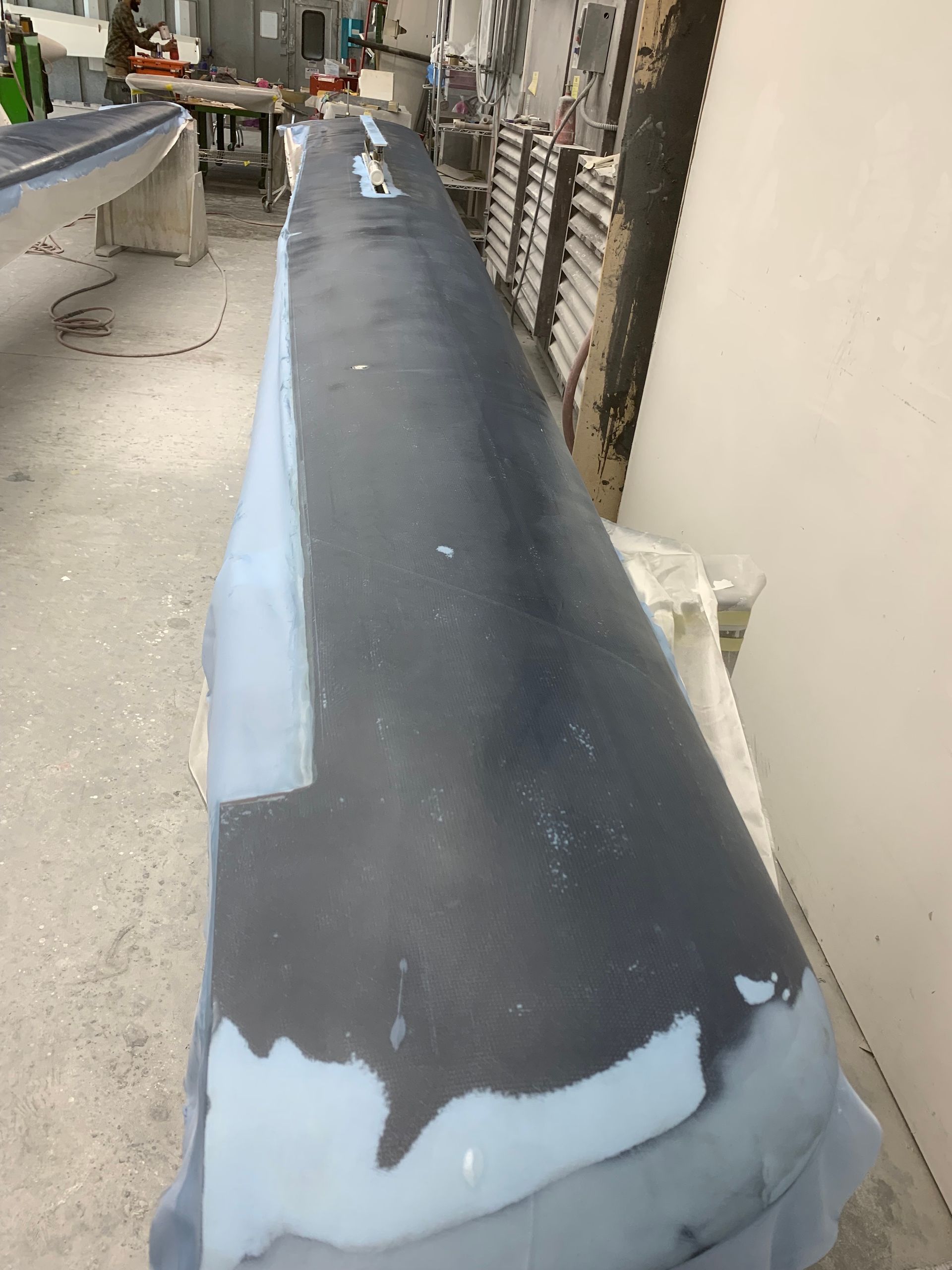 A large piece of foam is sitting on a table in a room.