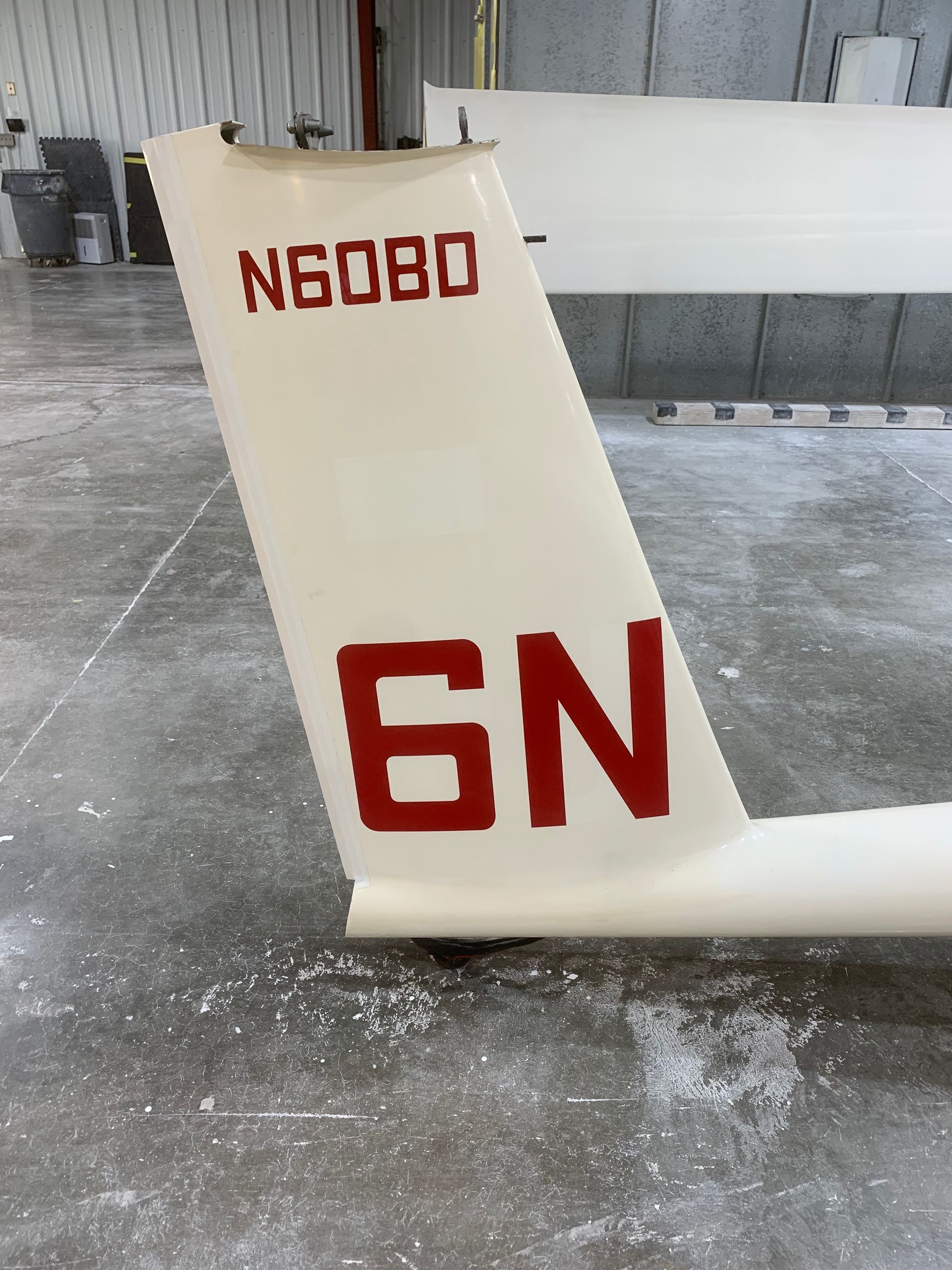 The tail of a plane with the number 6n on it