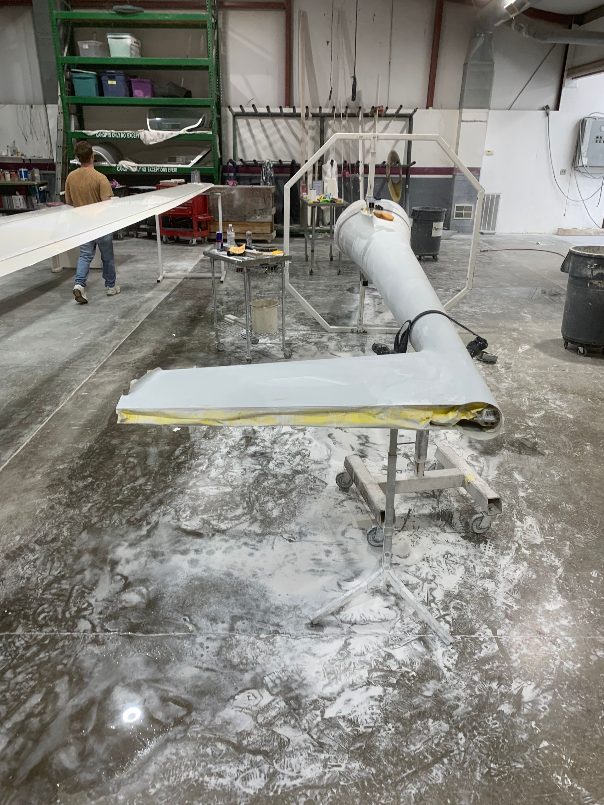 A large white object is sitting on a table in a room.