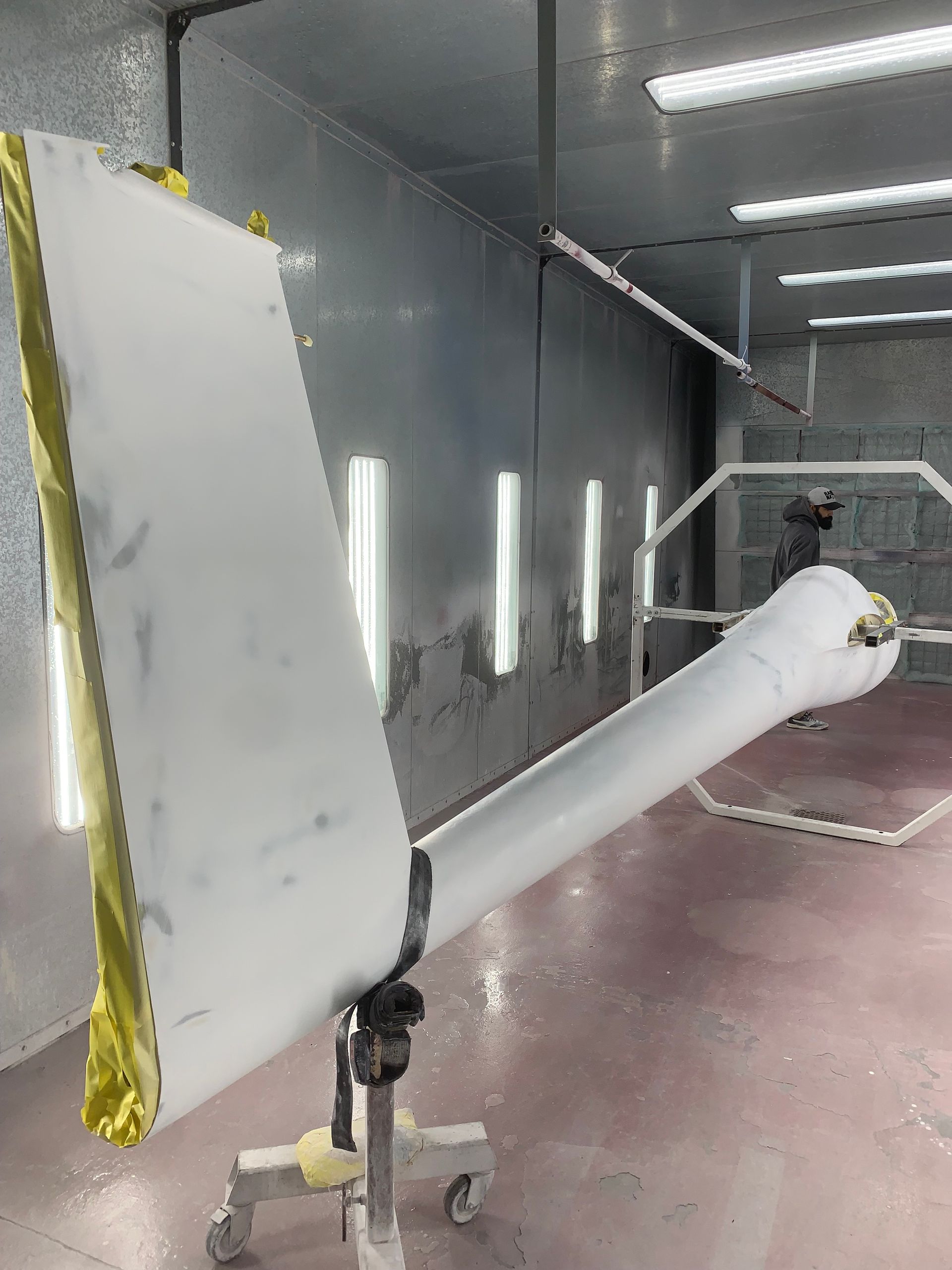 A white object is sitting on a table in a room.