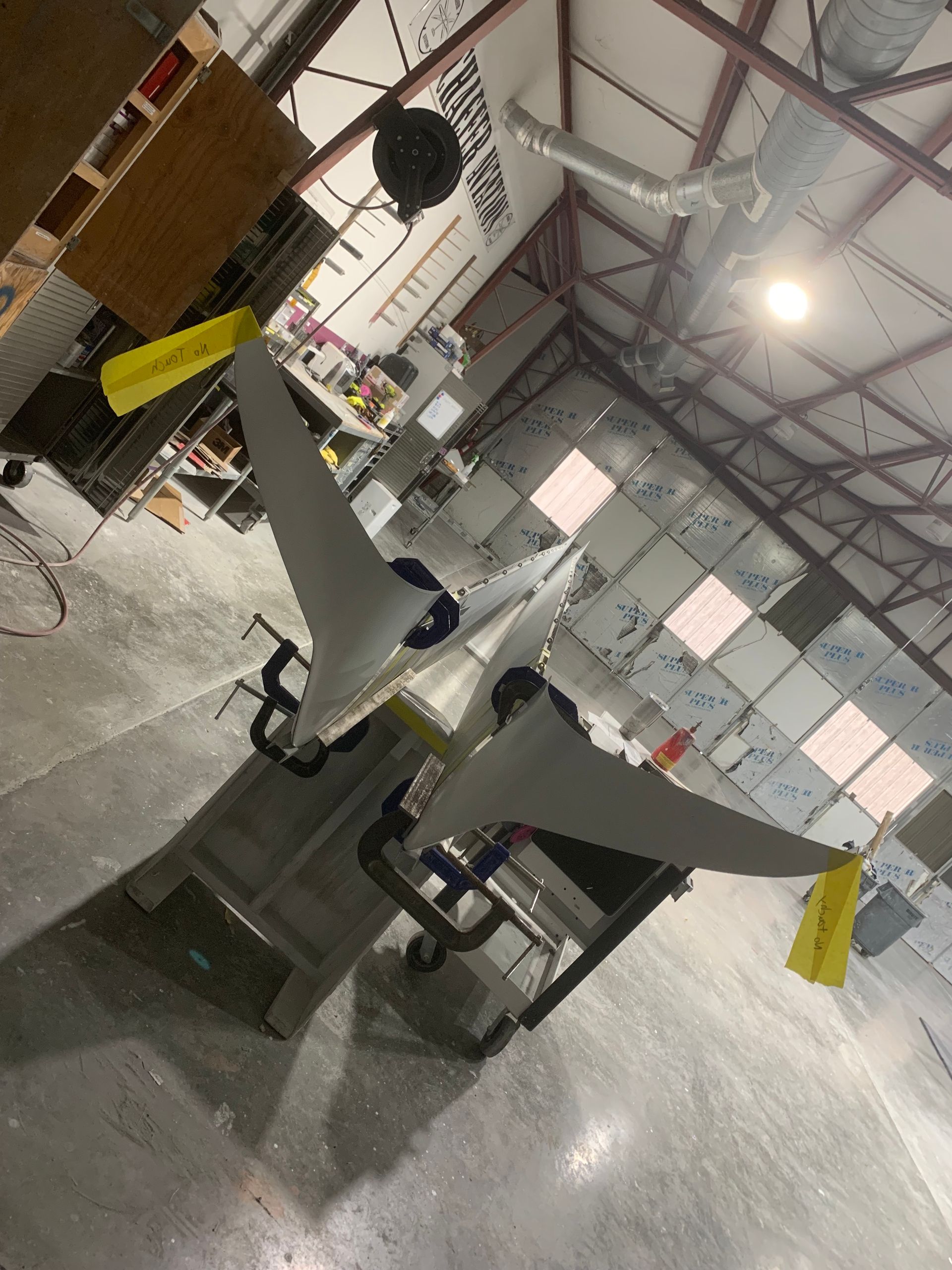 A model airplane is sitting on a table in a building