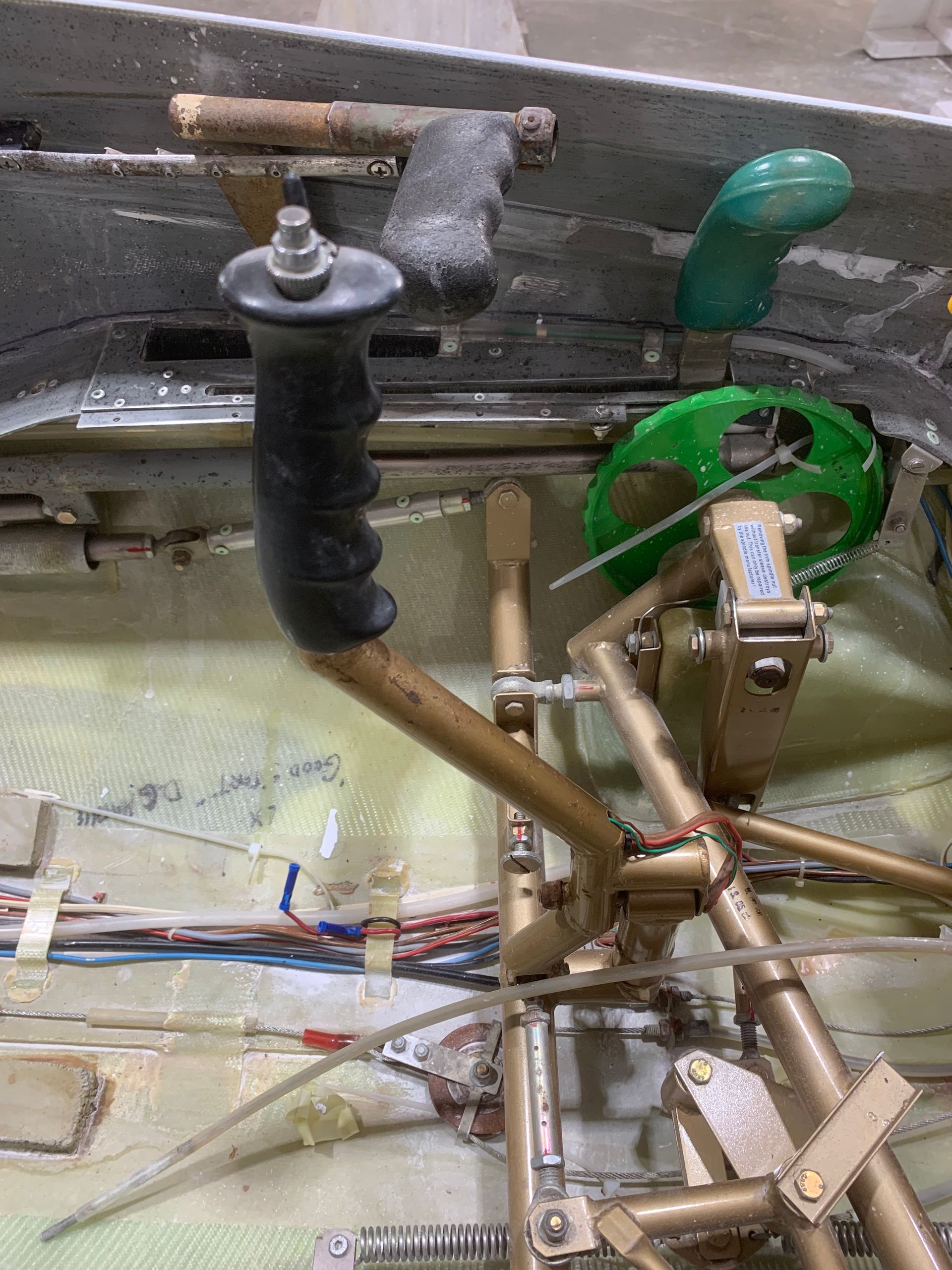 A close up of a steering wheel on a vehicle.