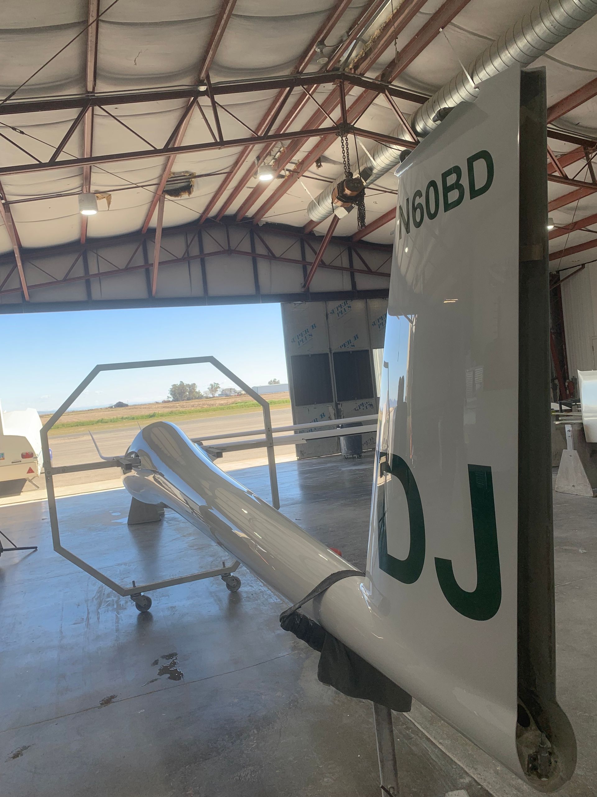 A plane that has the letters oj on it