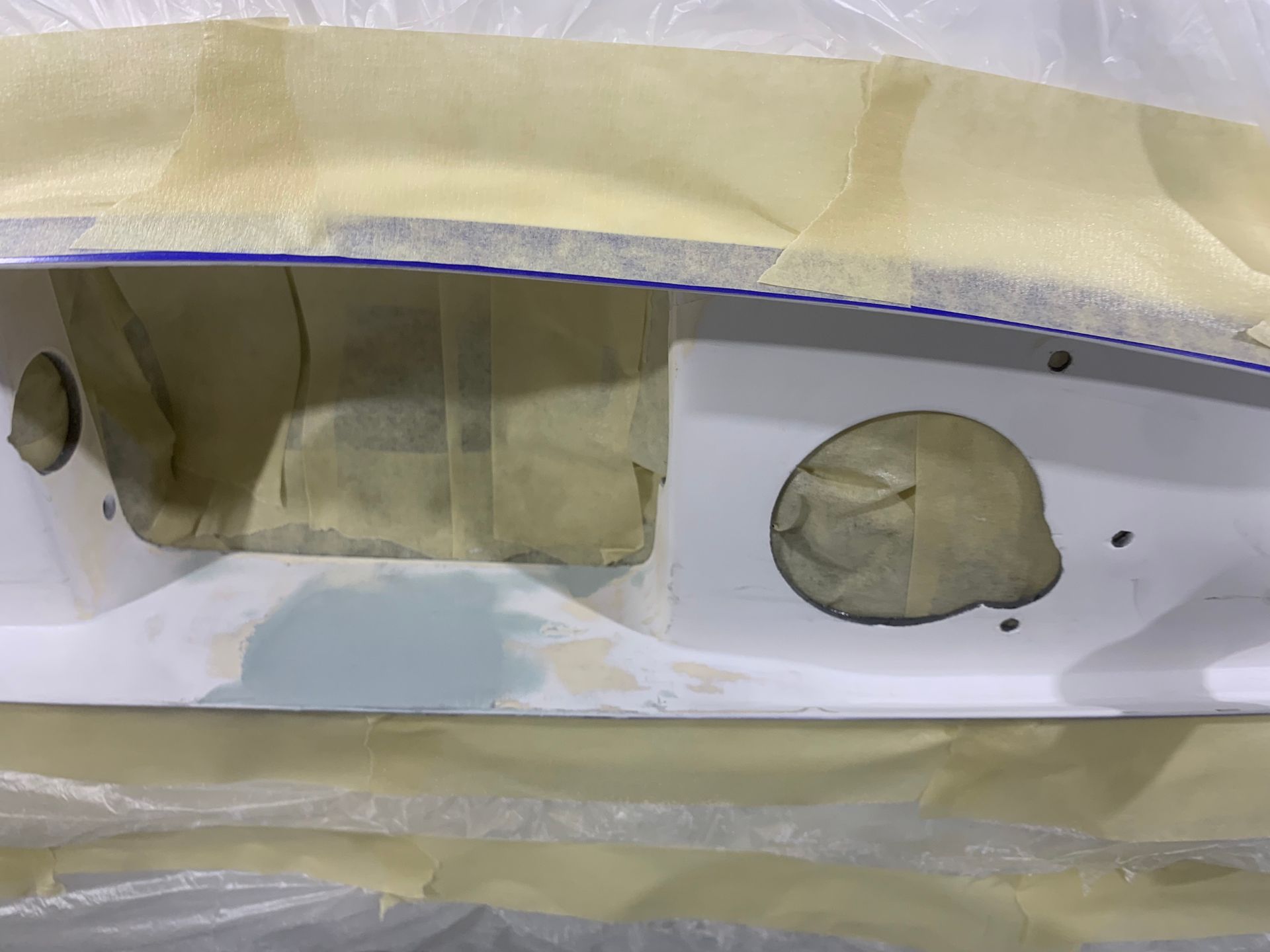 A close up of a piece of plastic with holes in it