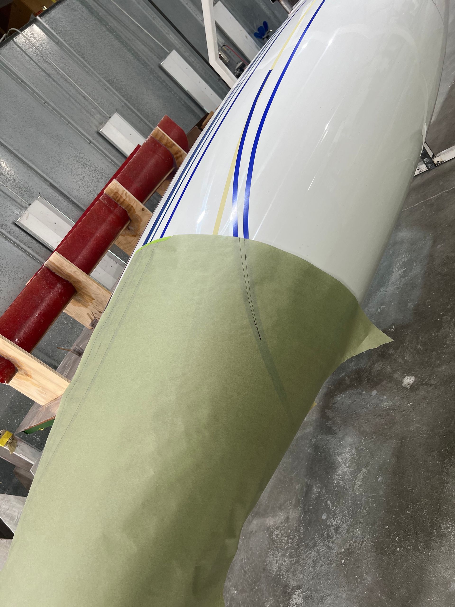 A close up of a white object with blue stripes on it