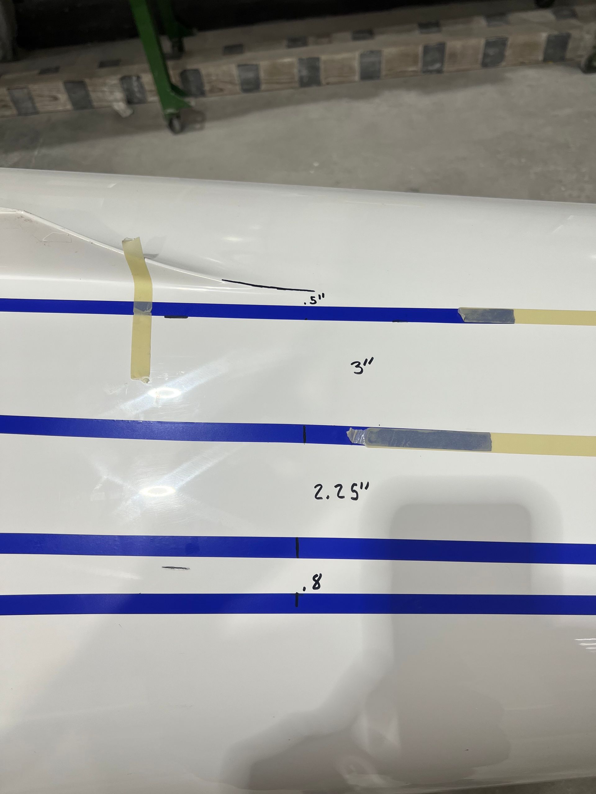 A white piece of paper with blue stripes on it