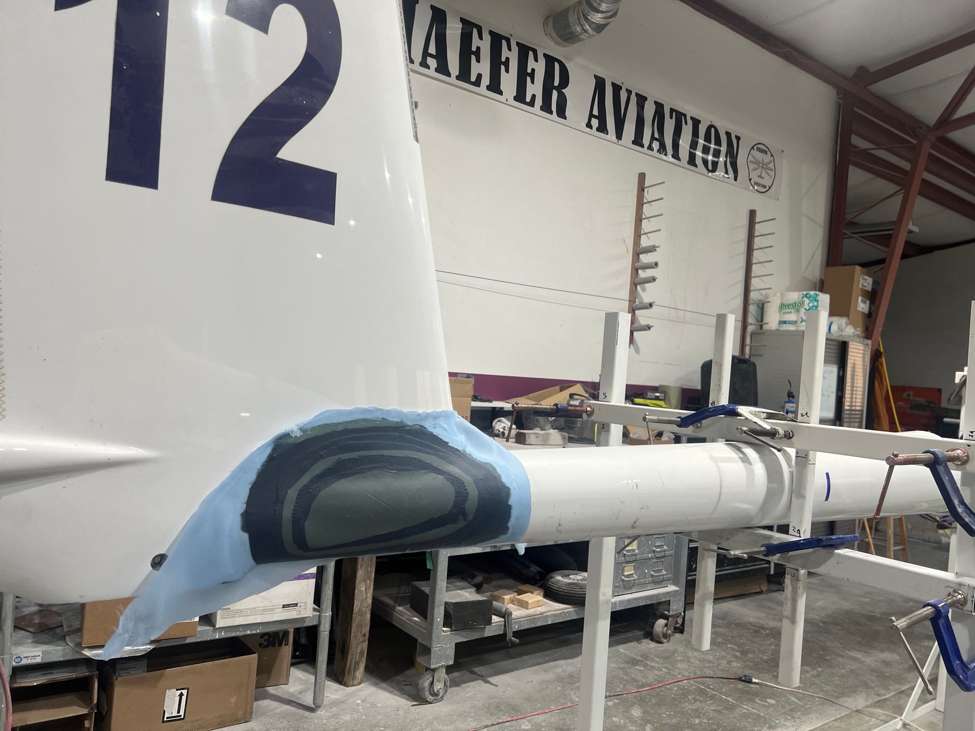 The number 12 is on the side of a plane