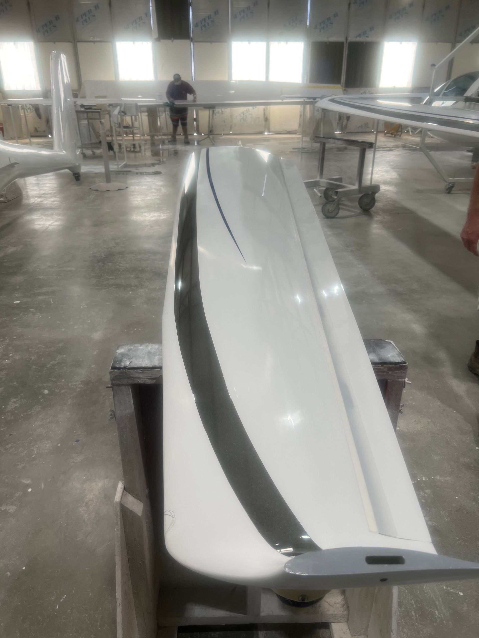 A large white object with a black stripe on it