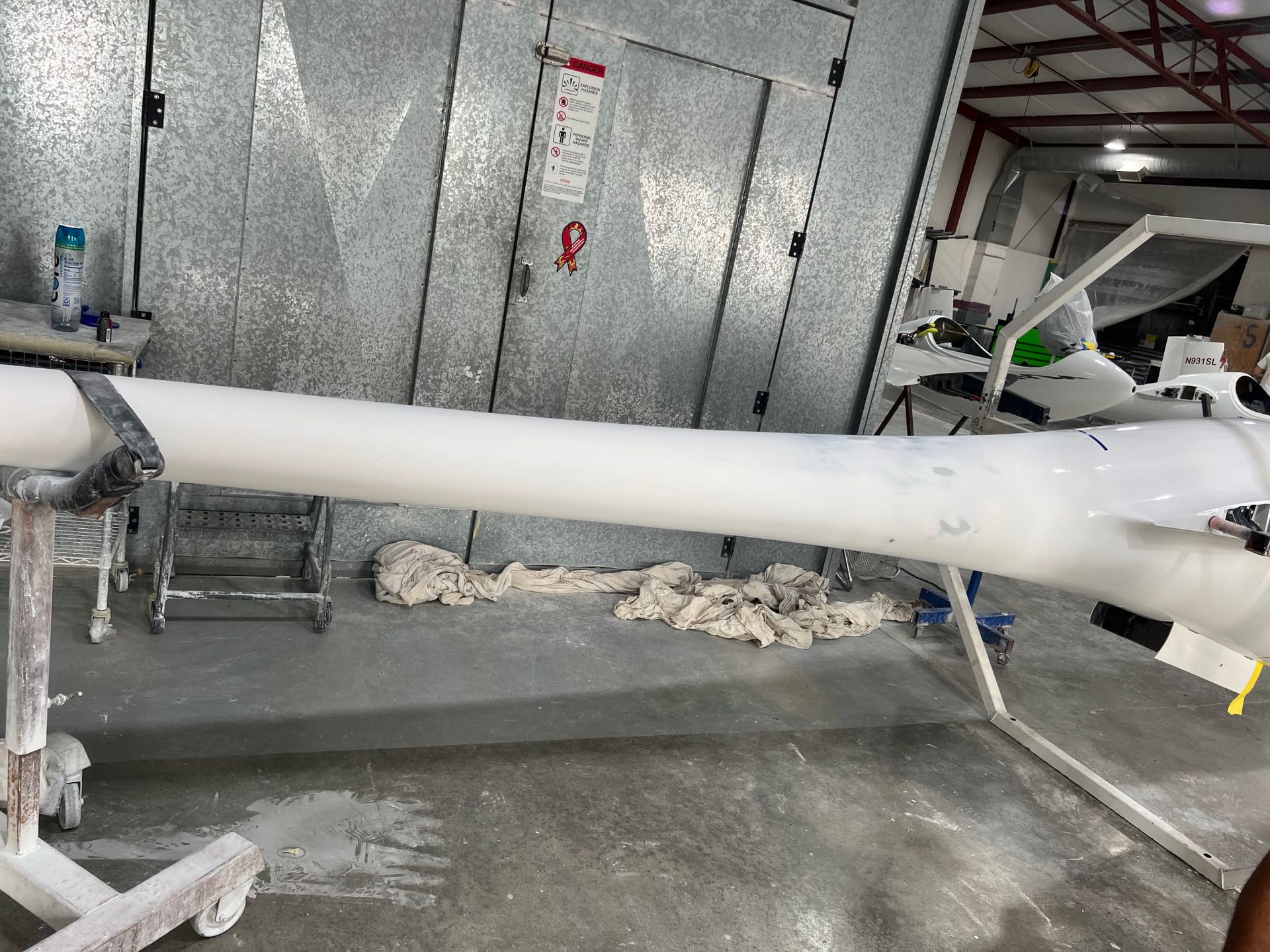 A large white pipe is sitting on a table in a room.