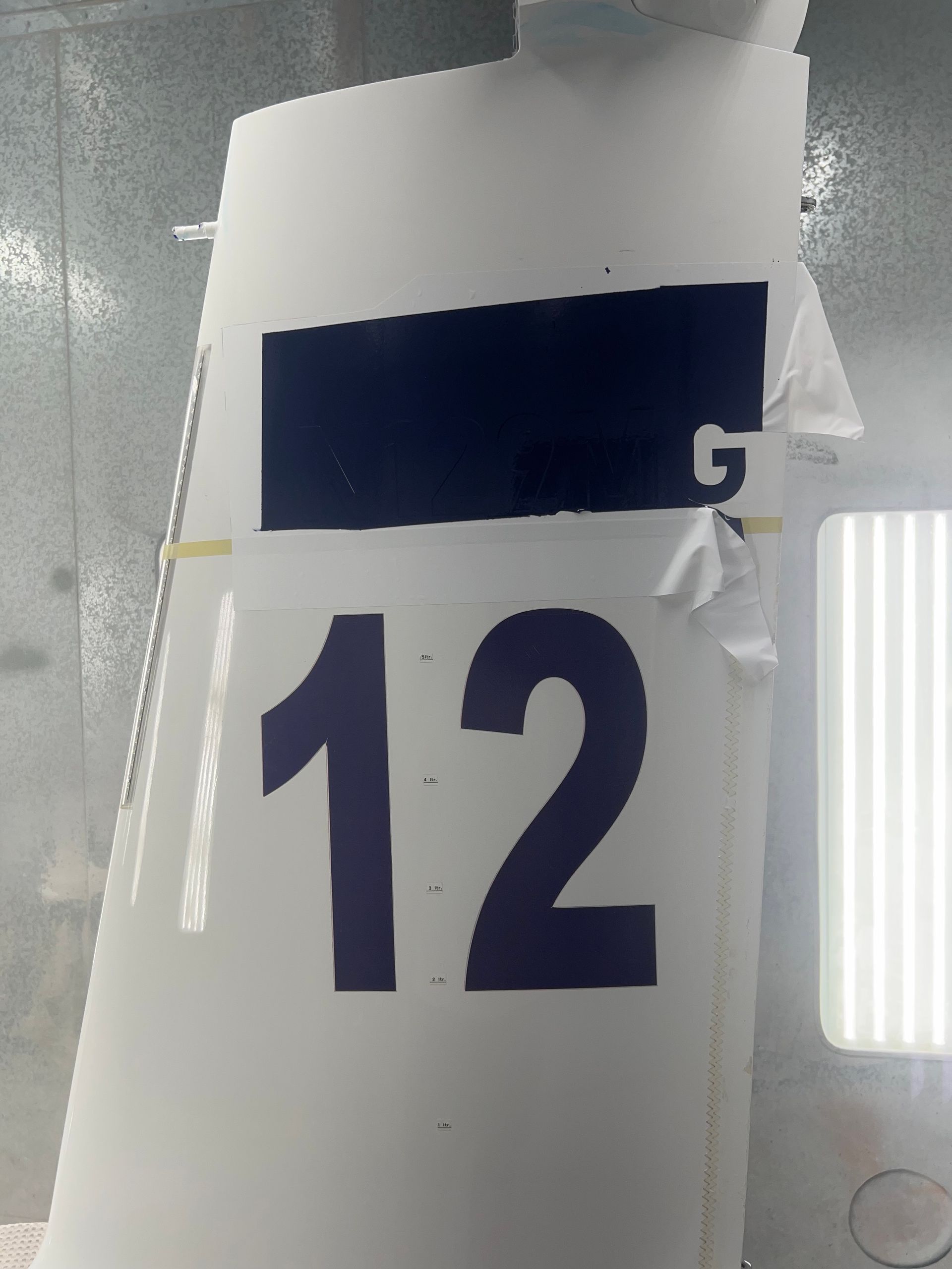 A white item with the number 12 on it