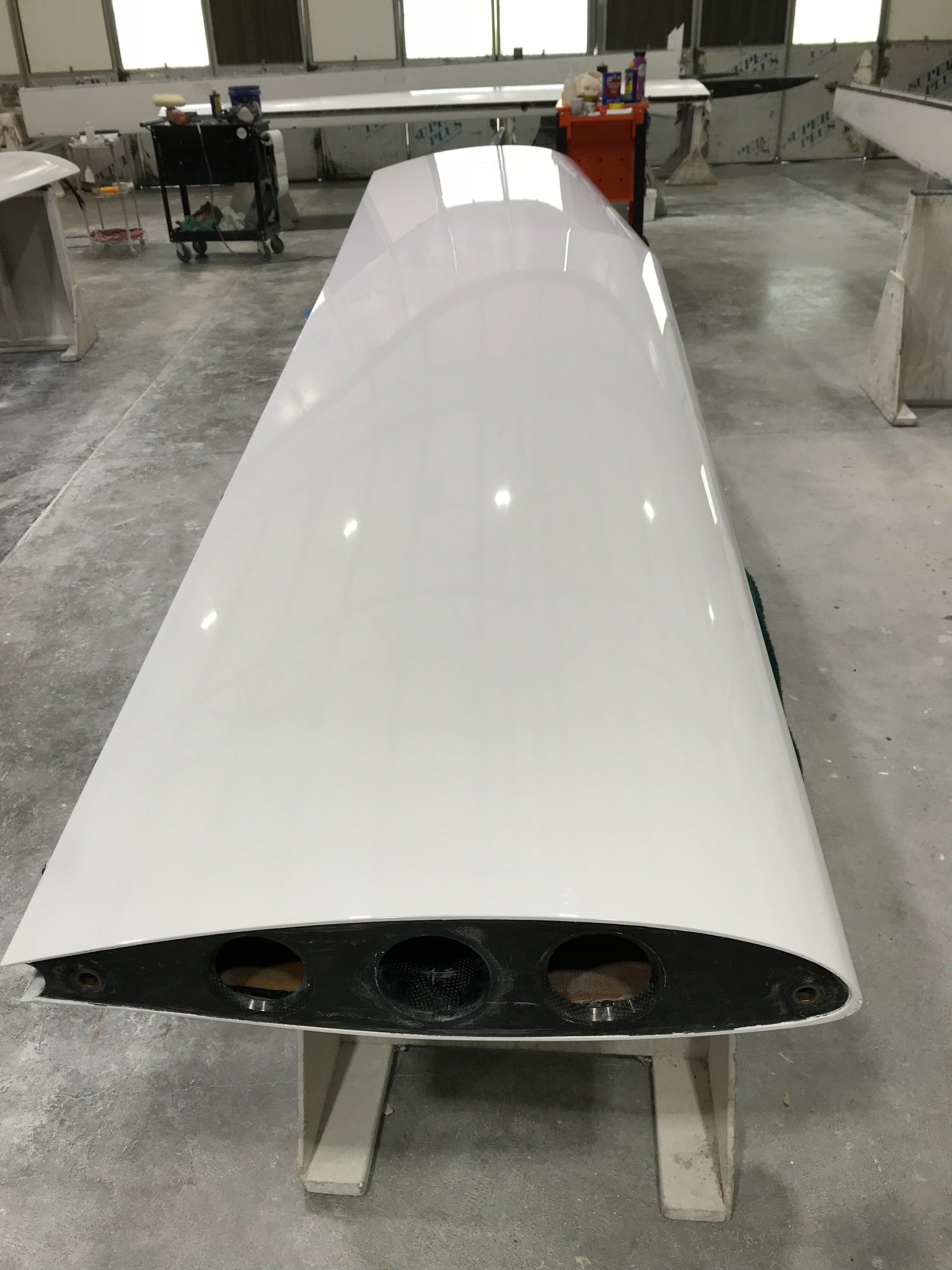 A large white object is sitting on a table in a room.