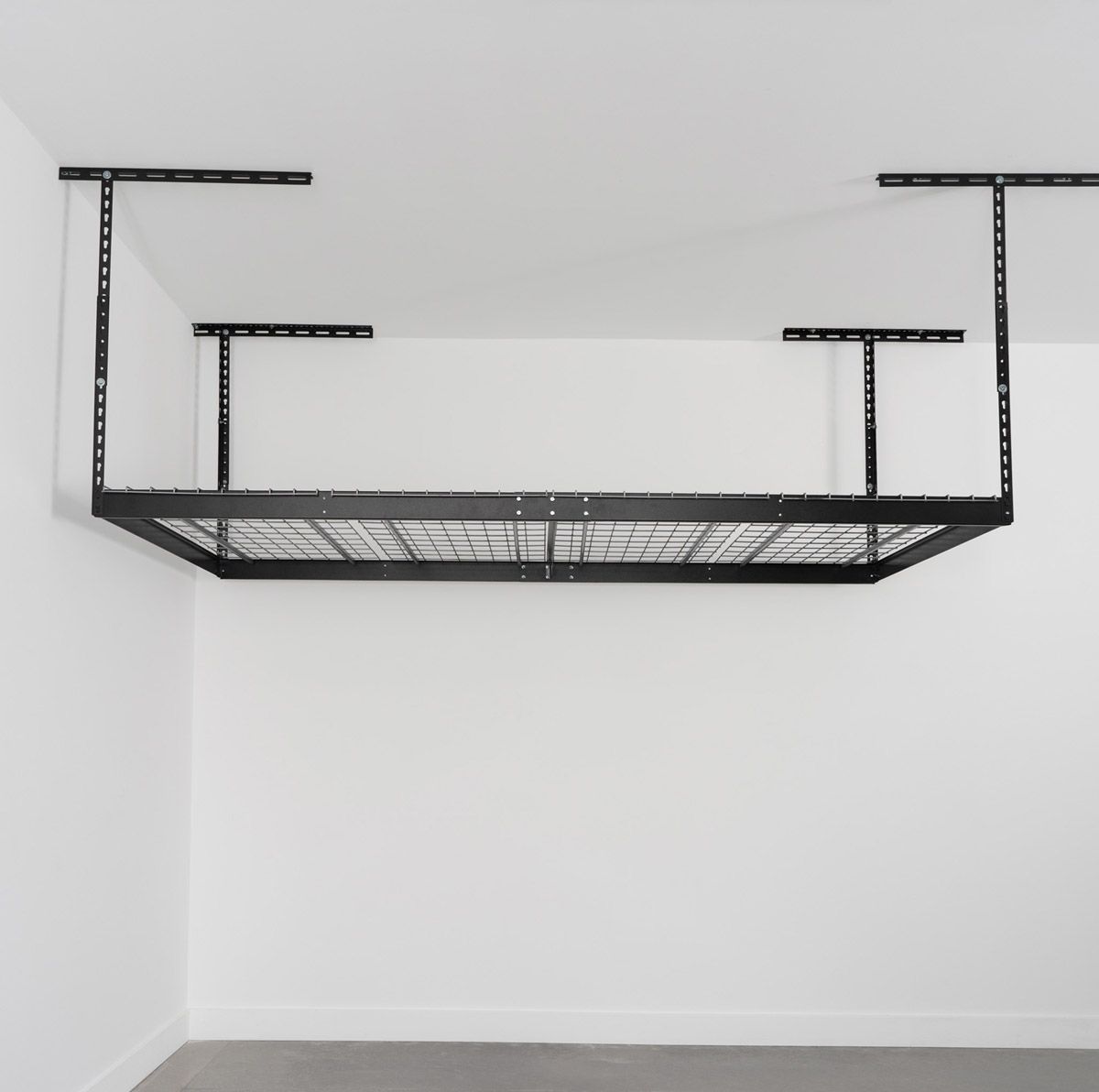 A garage with a ceiling rack hanging from it