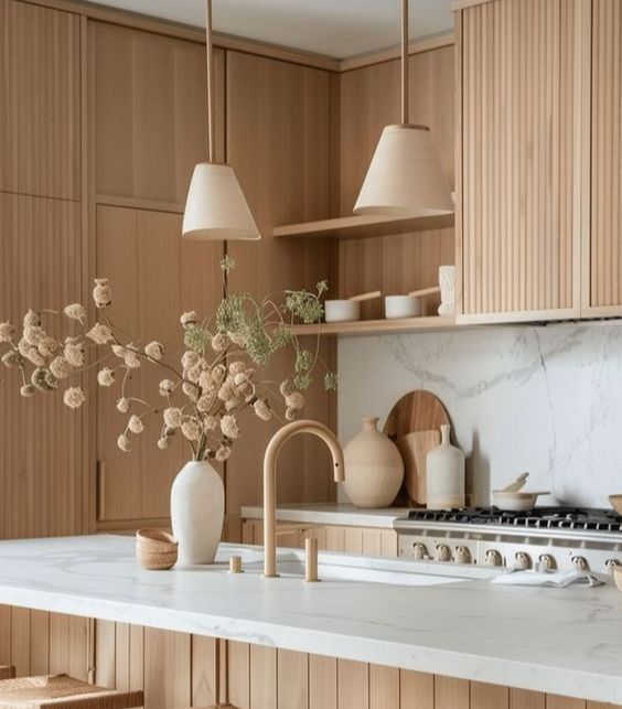 A kitchen with wooden cabinets and white counter tops