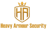 Gold logo for Heavy Armour Security with a crown atop an “HA” emblem, below text.