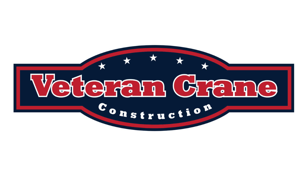Logo for Veteran Crane Construction with navy and red color scheme.