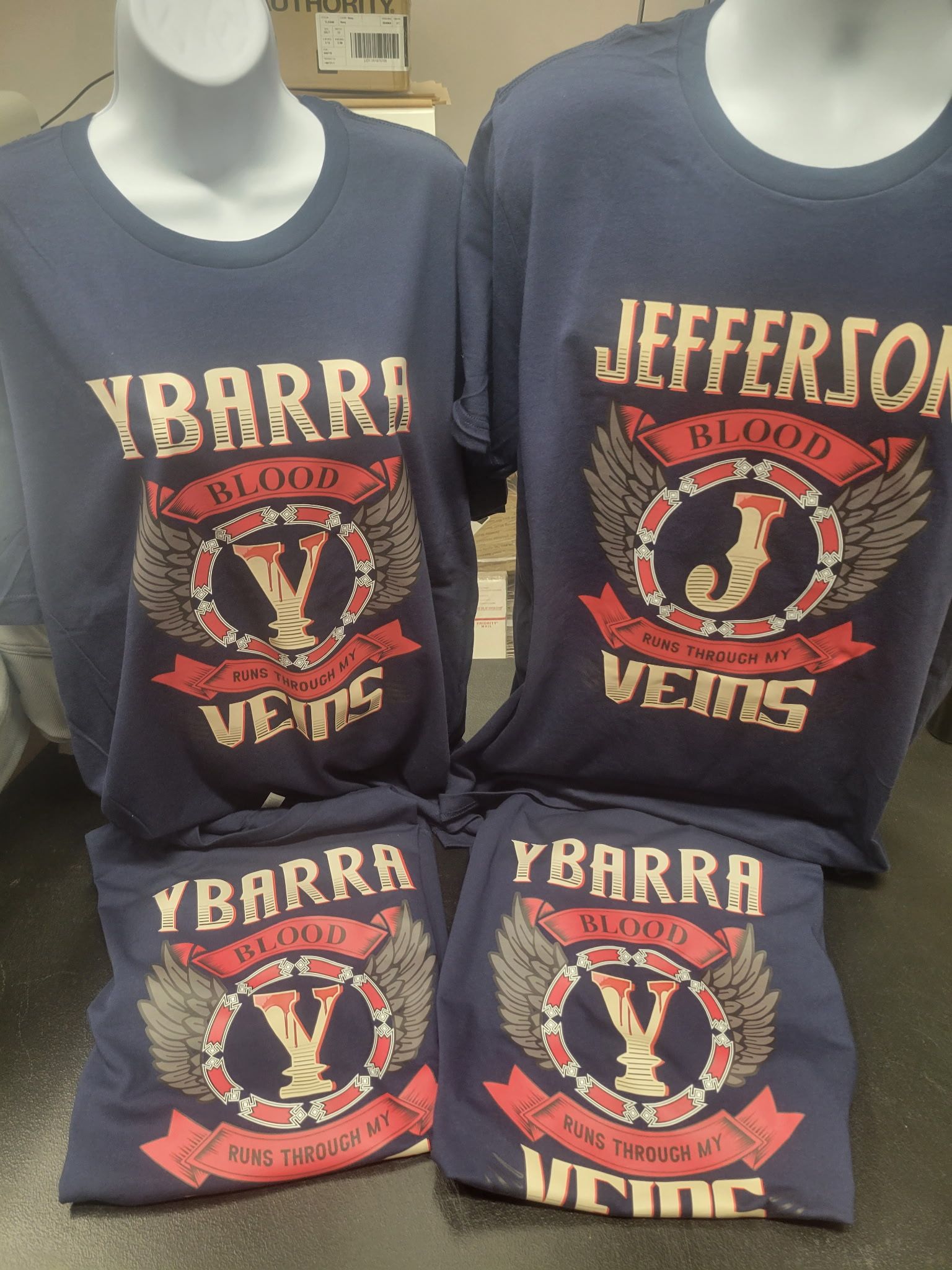 A couple of shirts with the name jefferson on them