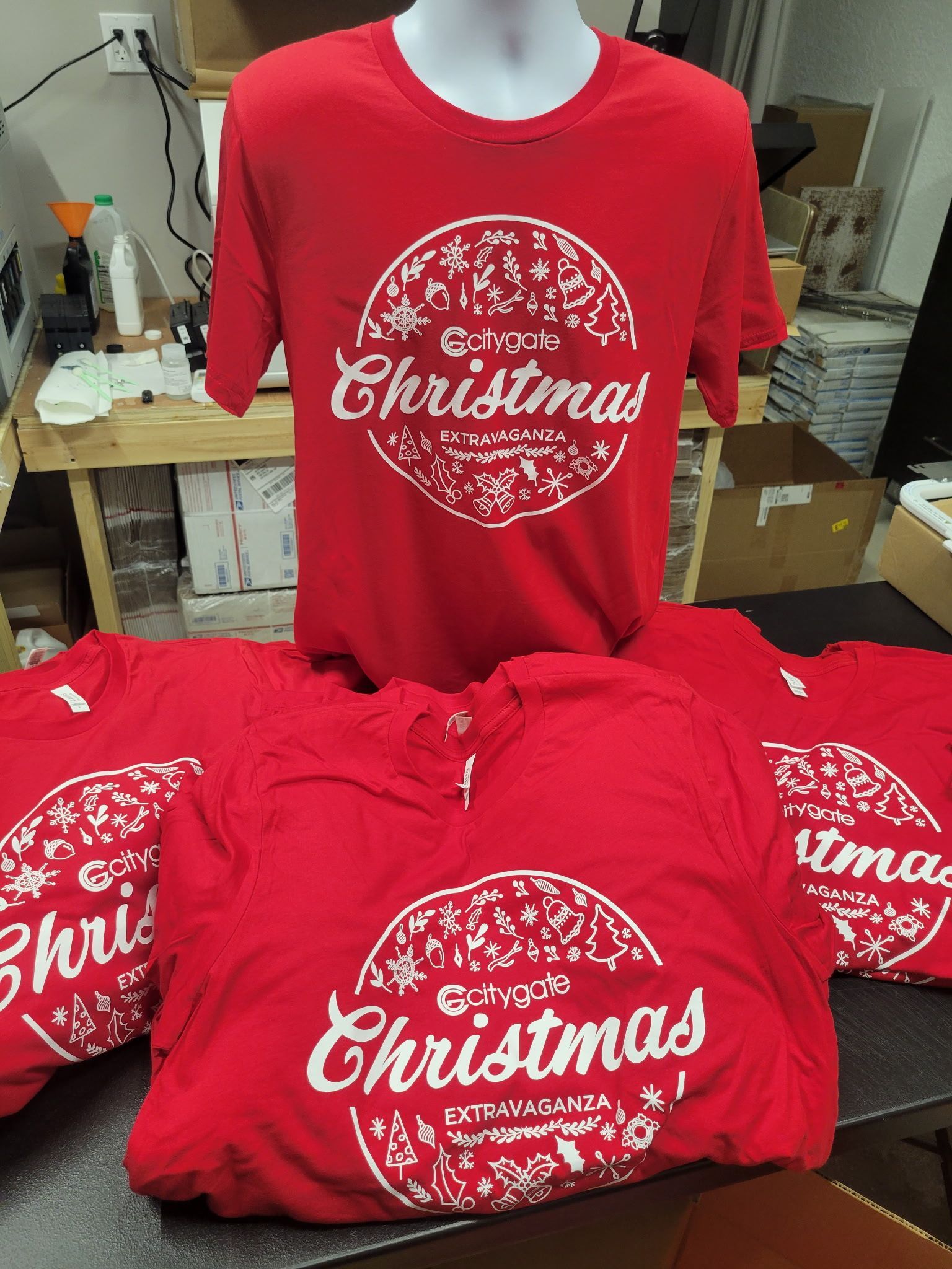 A red t-shirt that says merry christmas on it