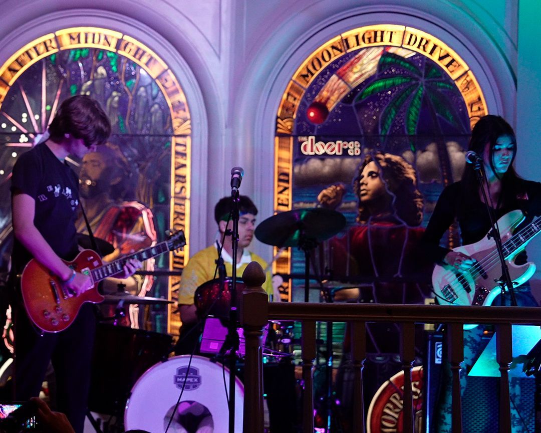 A band performing on the stage
