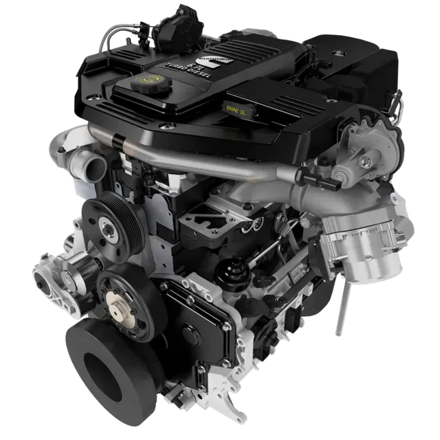 Black Cummins diesel engine, various pulleys and components visible.