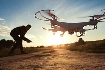 Pilot running drone — Aerial Surveyors in Tucson, AZ