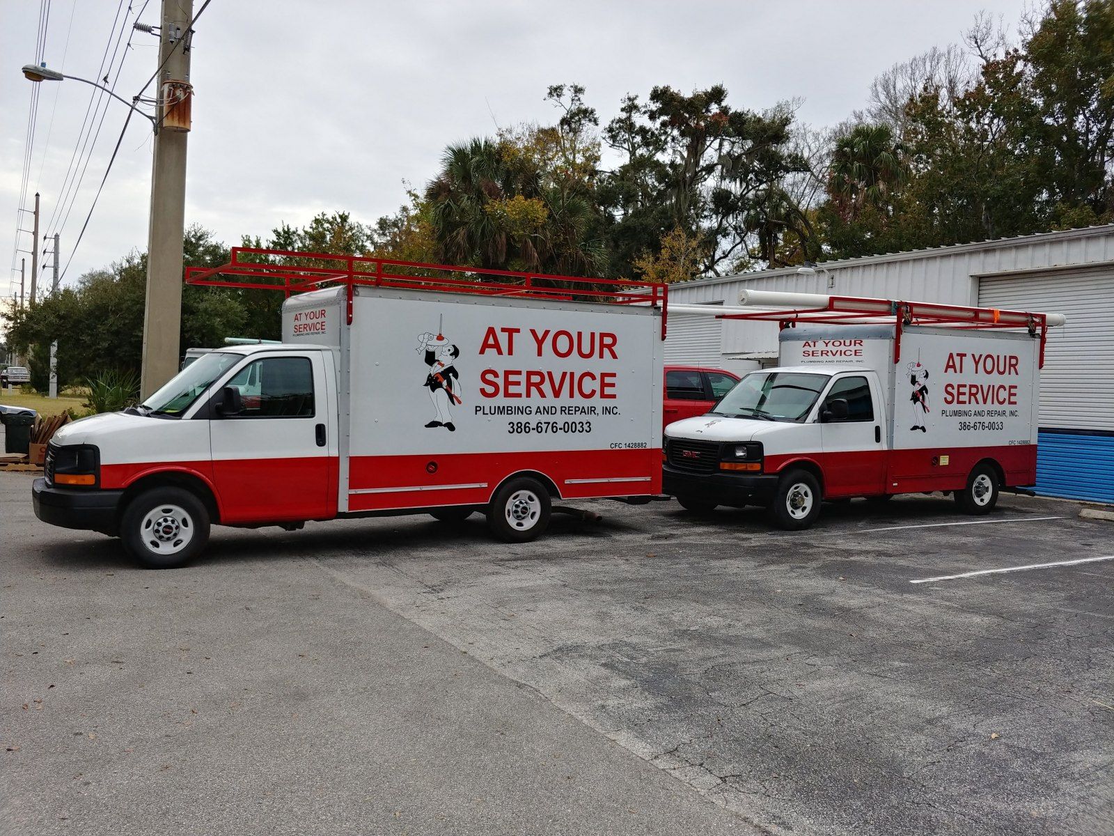 Two at your service vans are parked next to each other