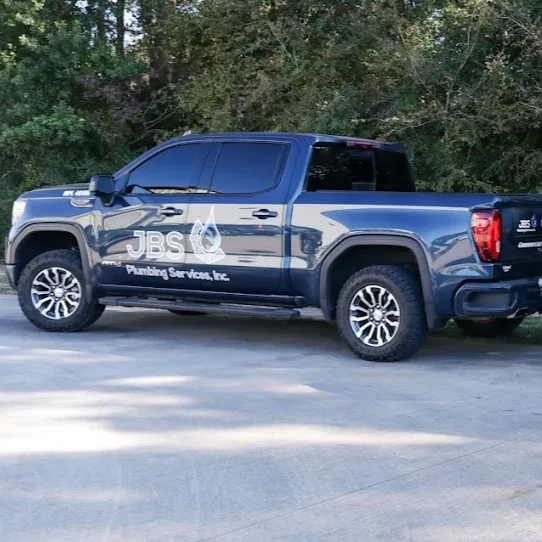 Blue pickup truck with company logo 