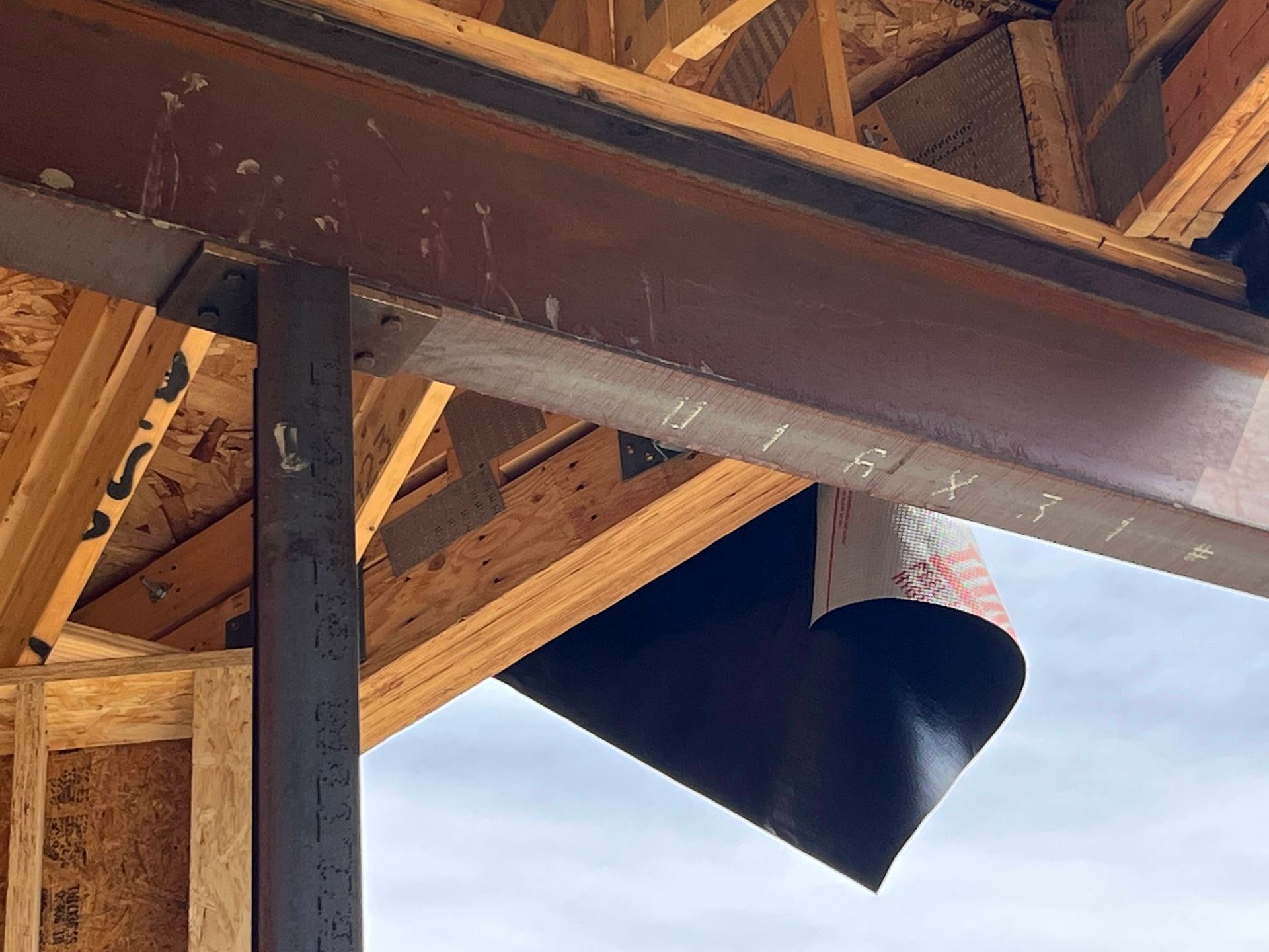 A close up of a wooden structure under construction