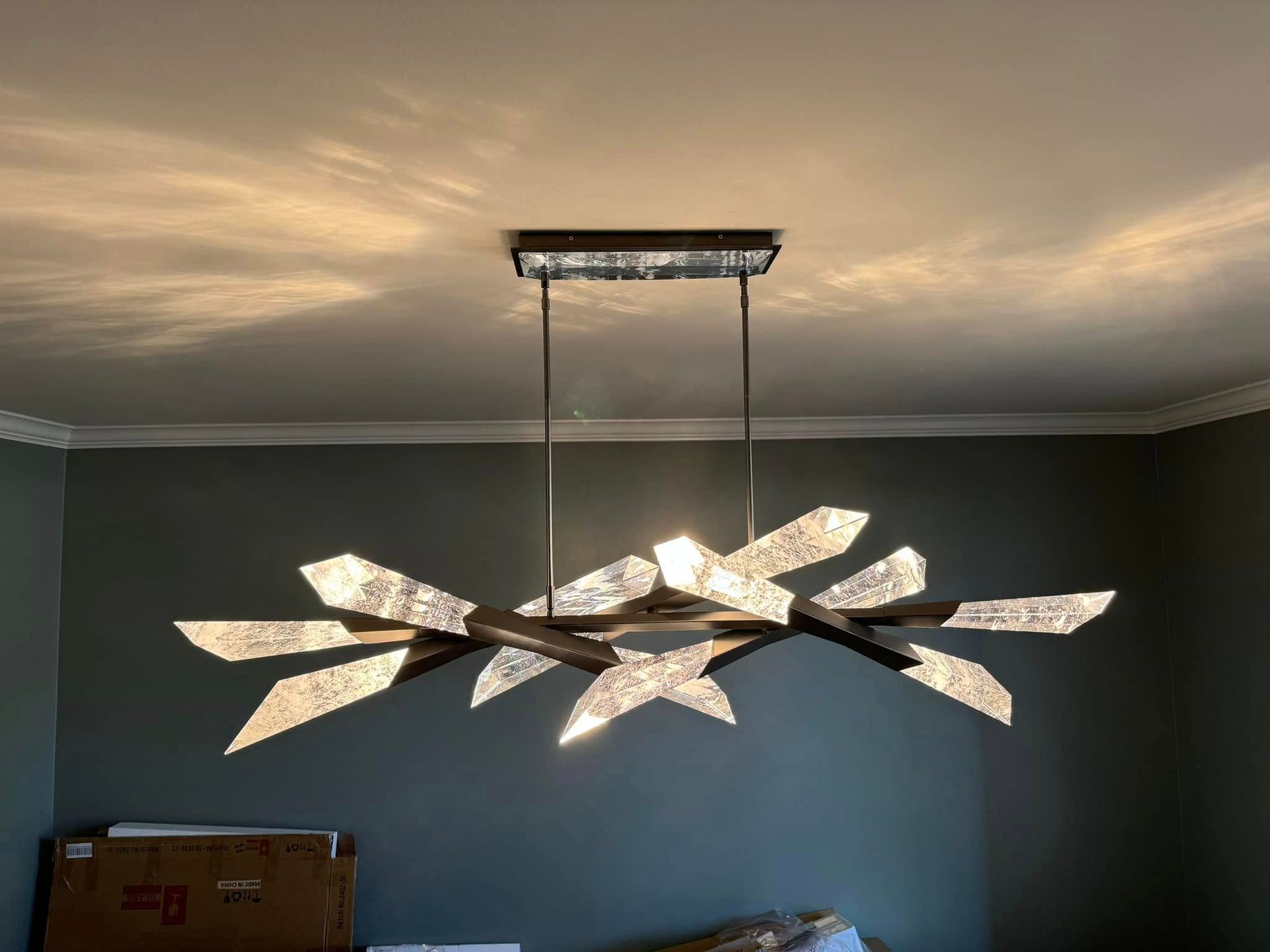 Contemporary chandelier installed by expert residential electricians