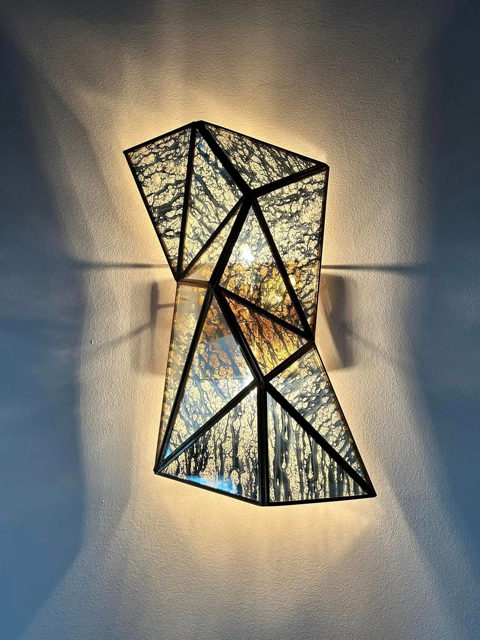 Modern wall sconce with custom indoor lighting design installation