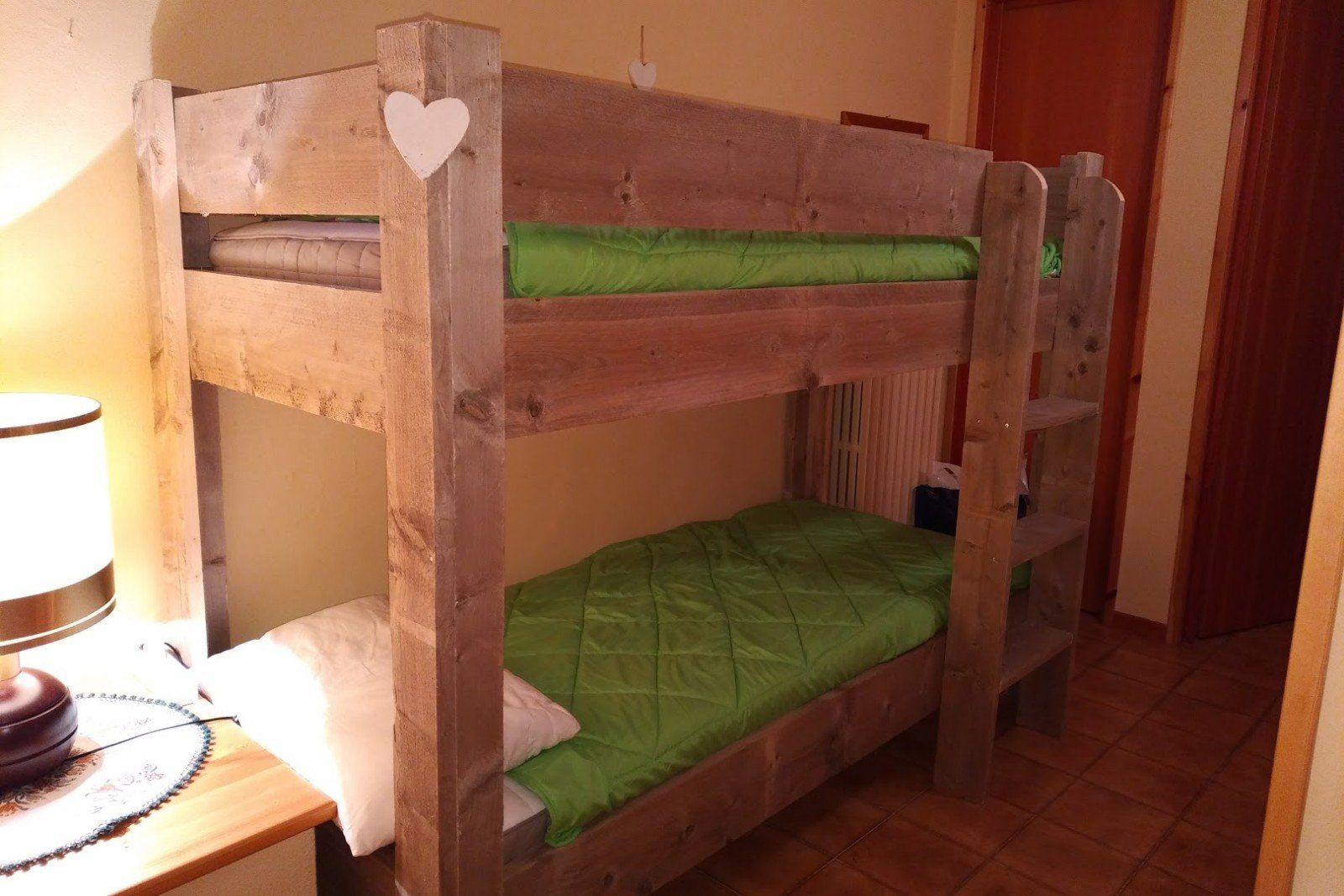 A bedroom with a bunkbed