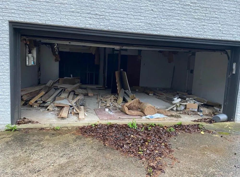 A garage door with a lot of wood in it.