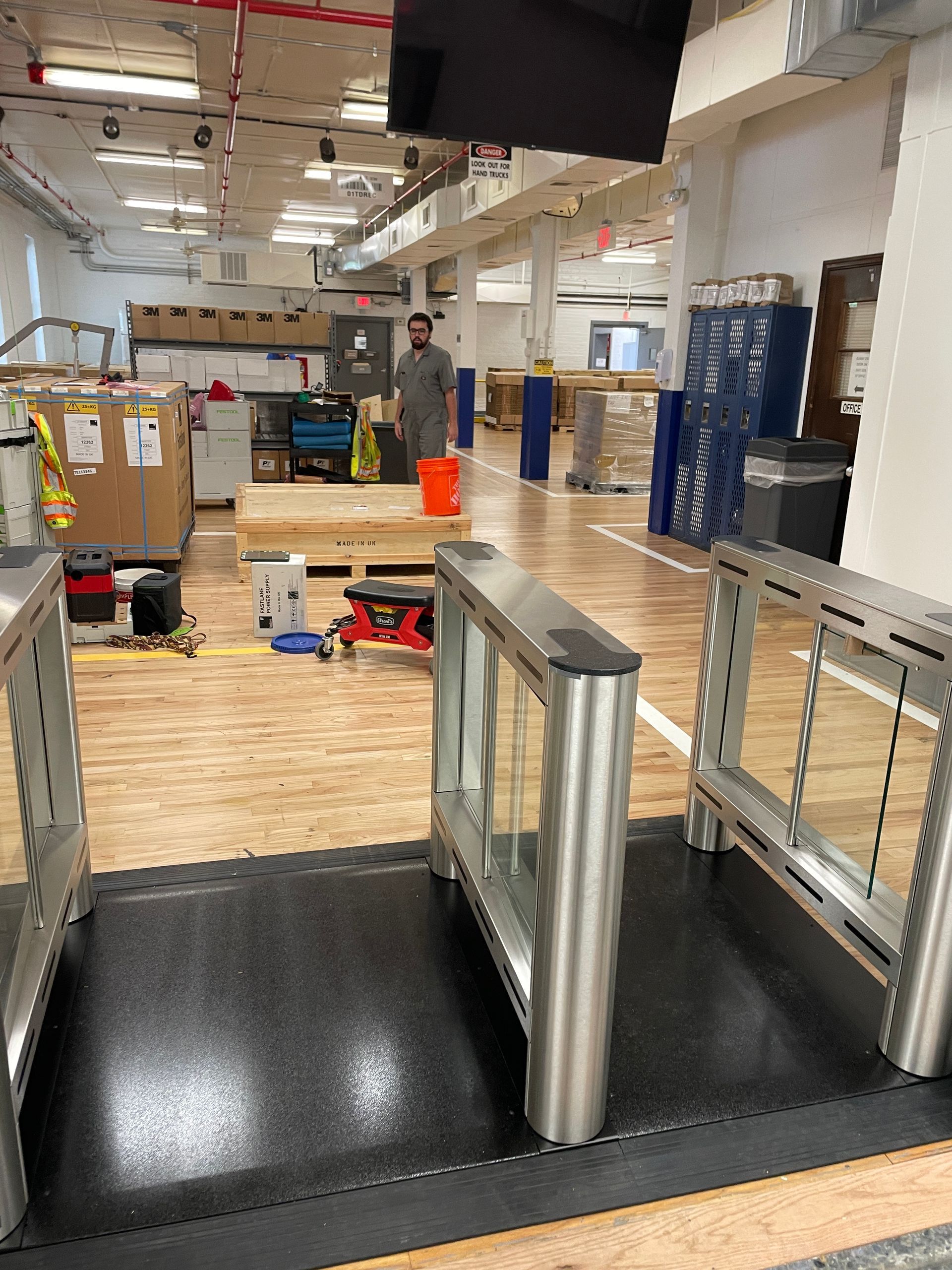 Turnstile entrance in a warehouse. 