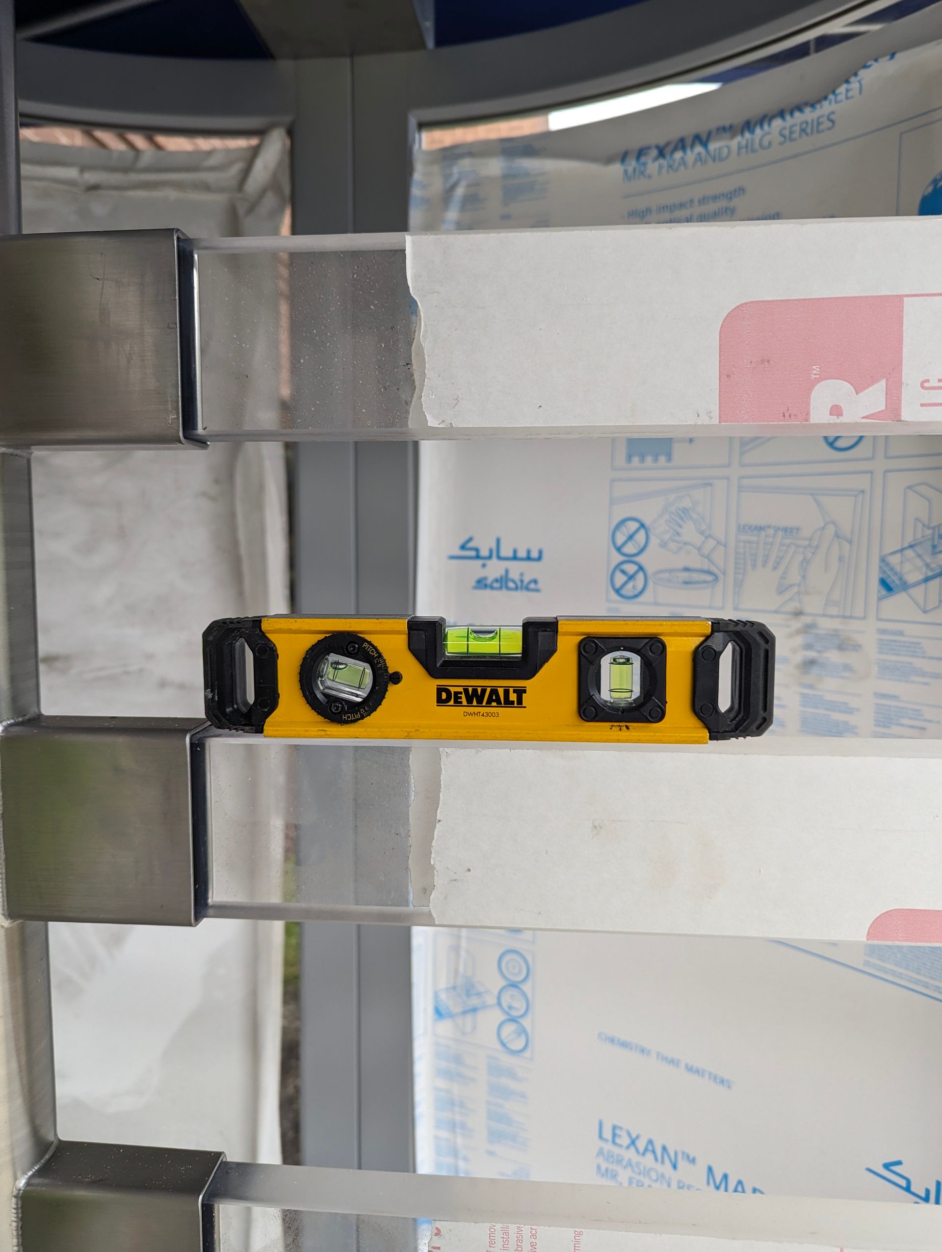 A level checks the horizontal alignment of an architectural element.