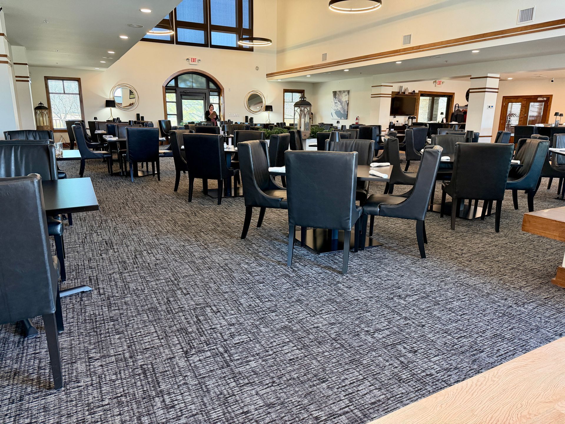 A large dining room filled with tables and chairs