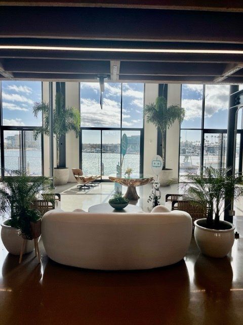 A large vase filled with lots of flowers and plants