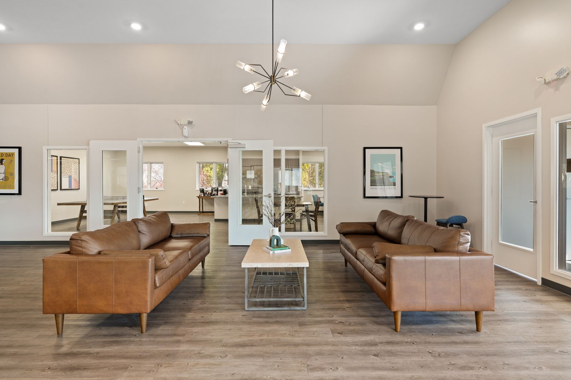 A living room with two couches and a coffee table.