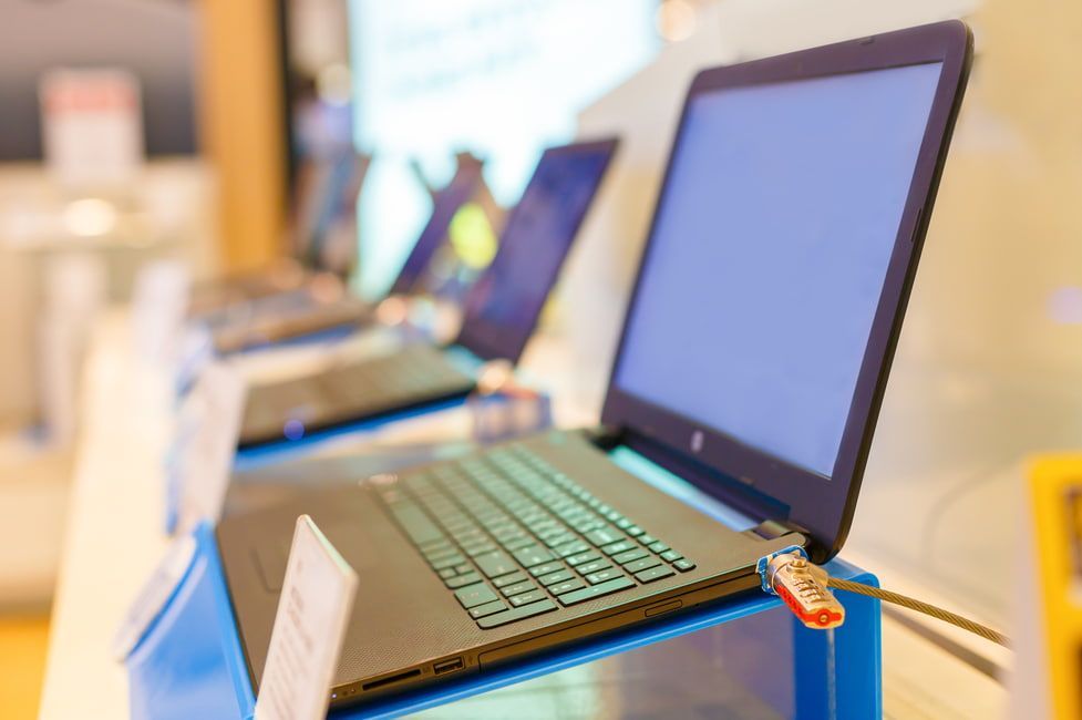 A Row Of Laptops Are On Display In A Store — Dateline Computers Authorised Jaycar Reseller In Cannonvale, QLD