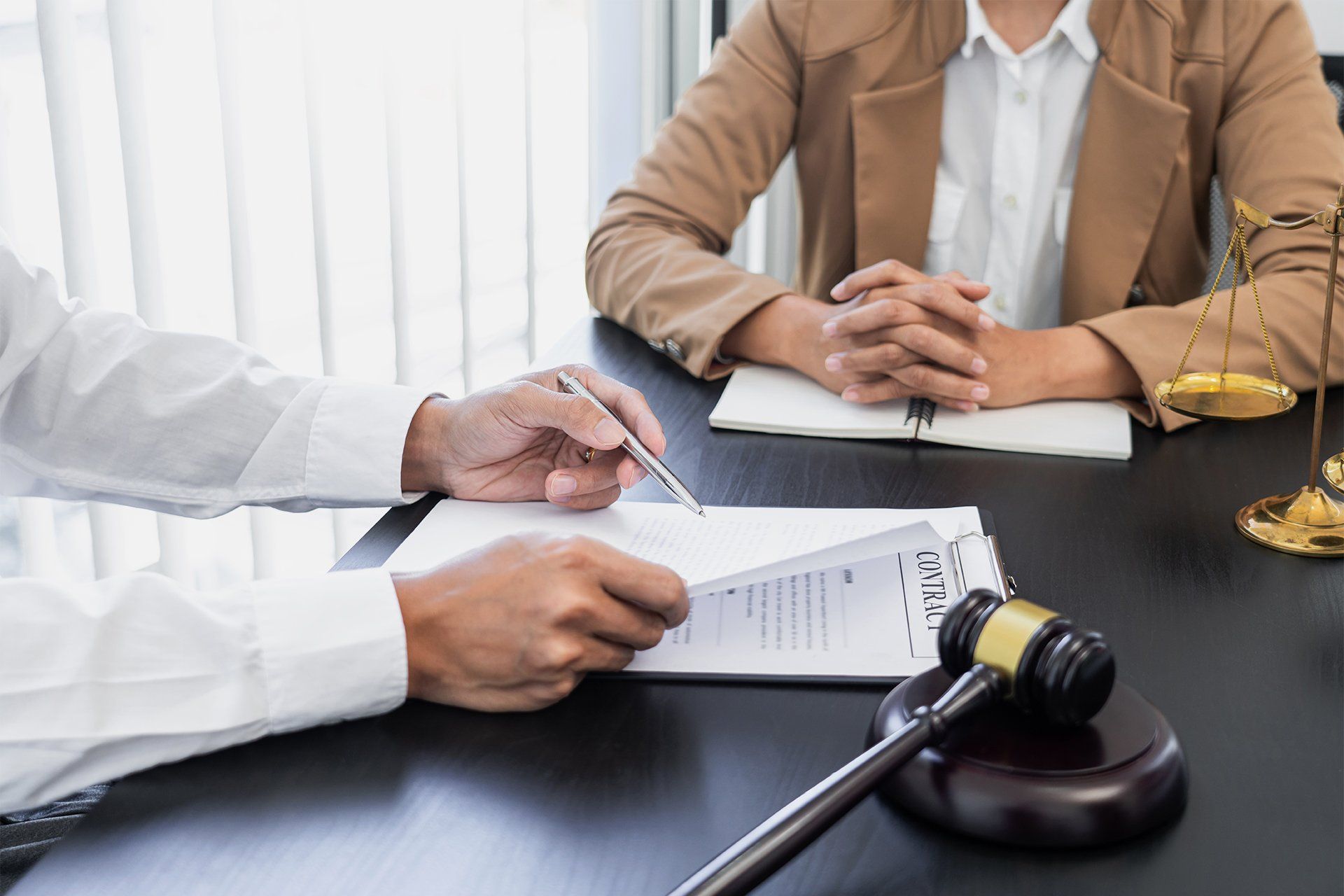 Lawyer and Client Discussing About Contract Agreement