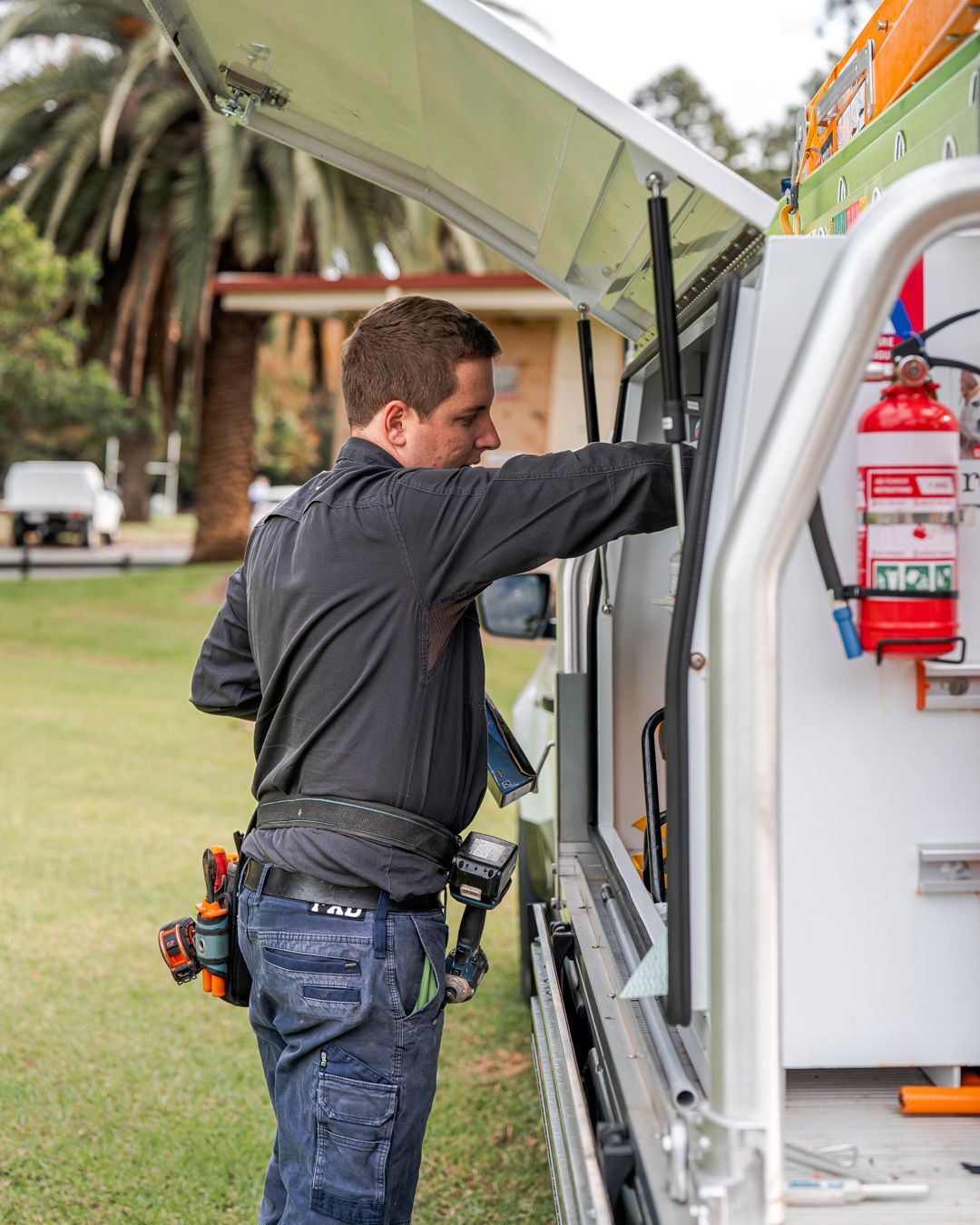 Integrated Services team member loading ute 