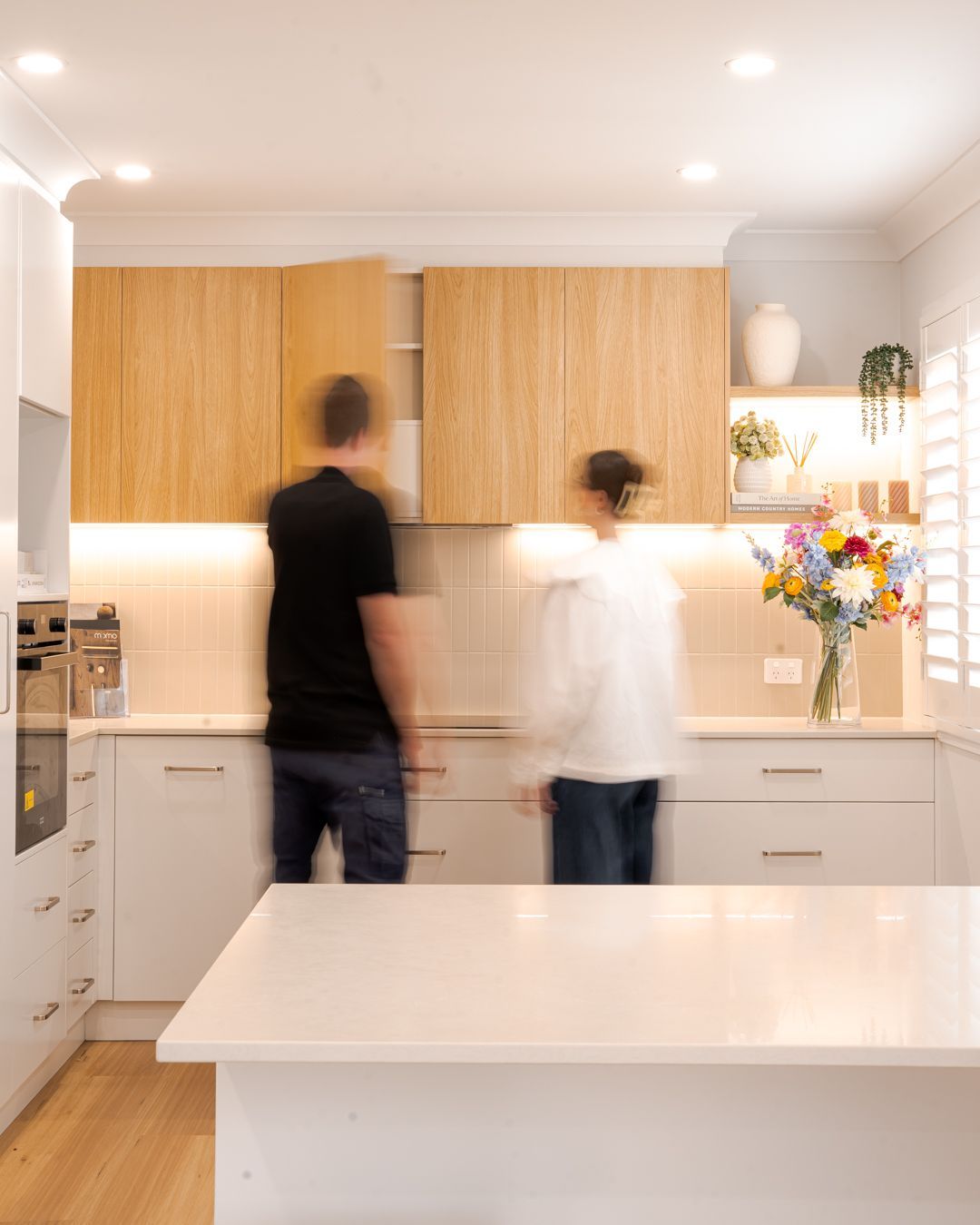 Integrated Services team member with customer in showroom in Toowoomba