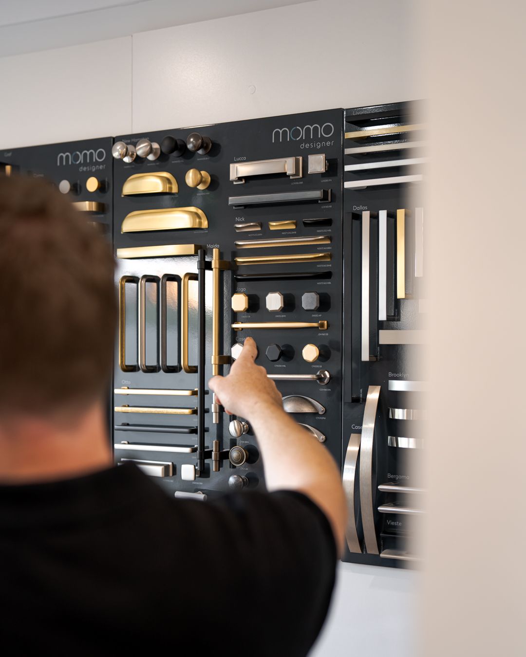 Pinting out products at Integrated Services Toowoomba showroom