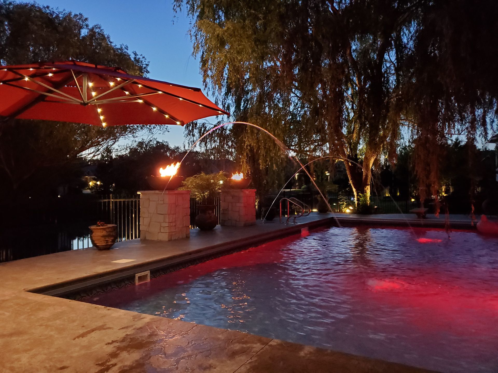Relaxing Swimming Pool At Night — Wichita, KS — Platinum Pools Inc.