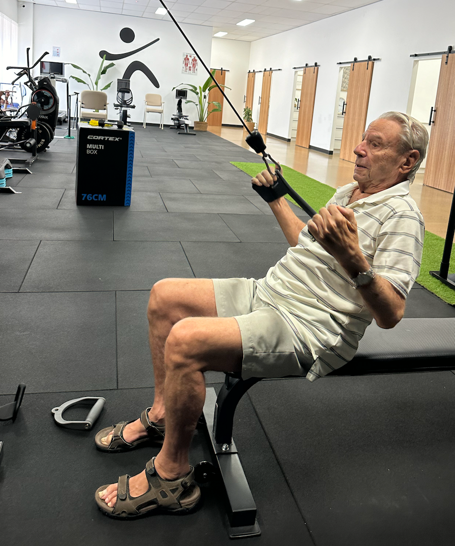 elderly man using gym equipment — Inner Balance Health in Darwin