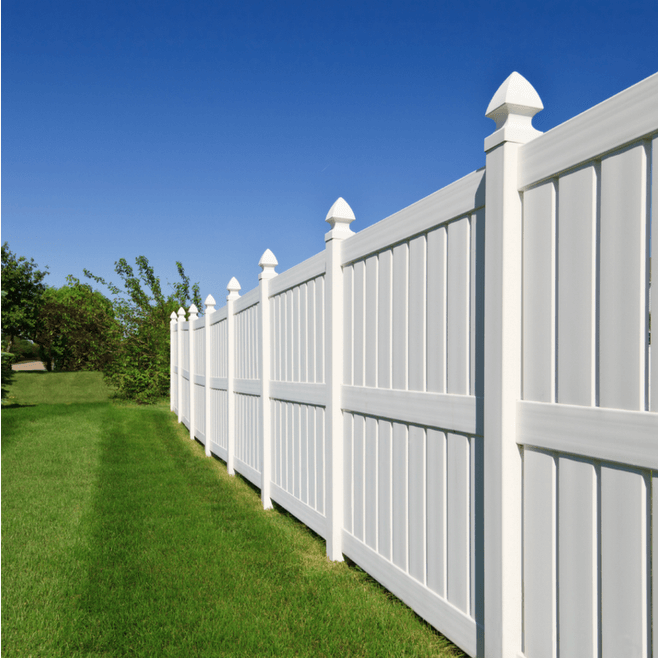 ornamental posts and paneled white vinyl fencing 