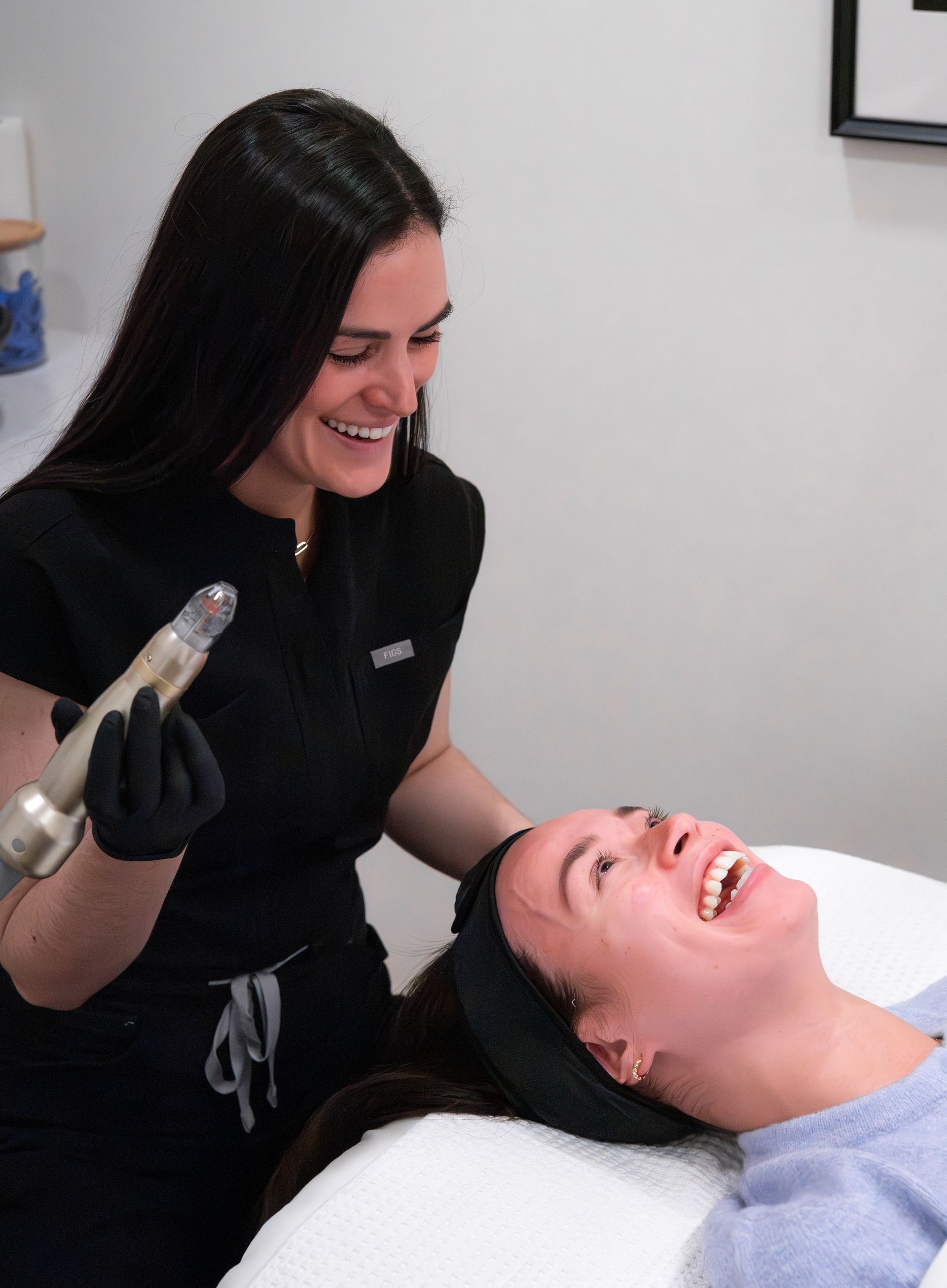 a woman is getting a treatment