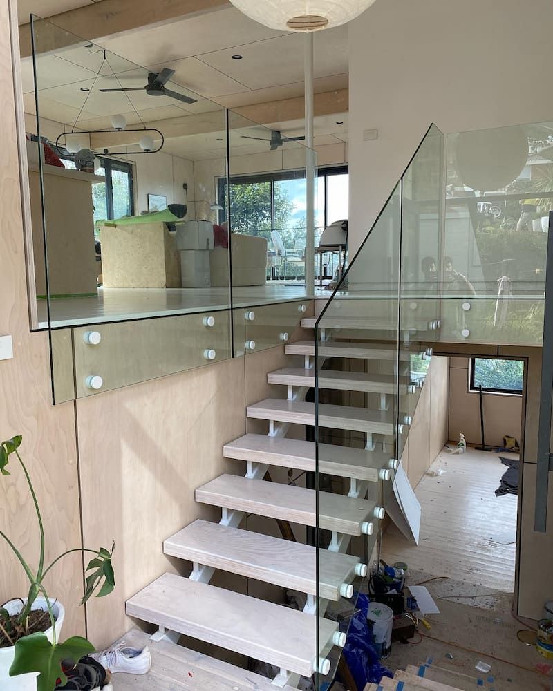 A Staircase with a Glass Railing in a House — Bulli Glass in Bulli, NSW