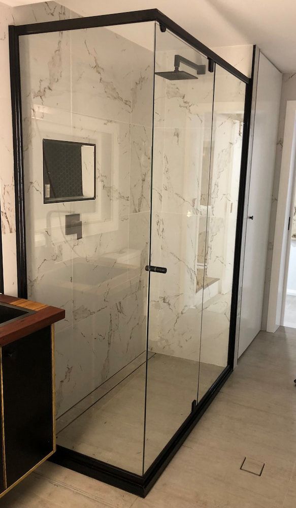 A Bathroom with a Walk in Shower and a Sink — Bulli Glass in Bulli, NSW