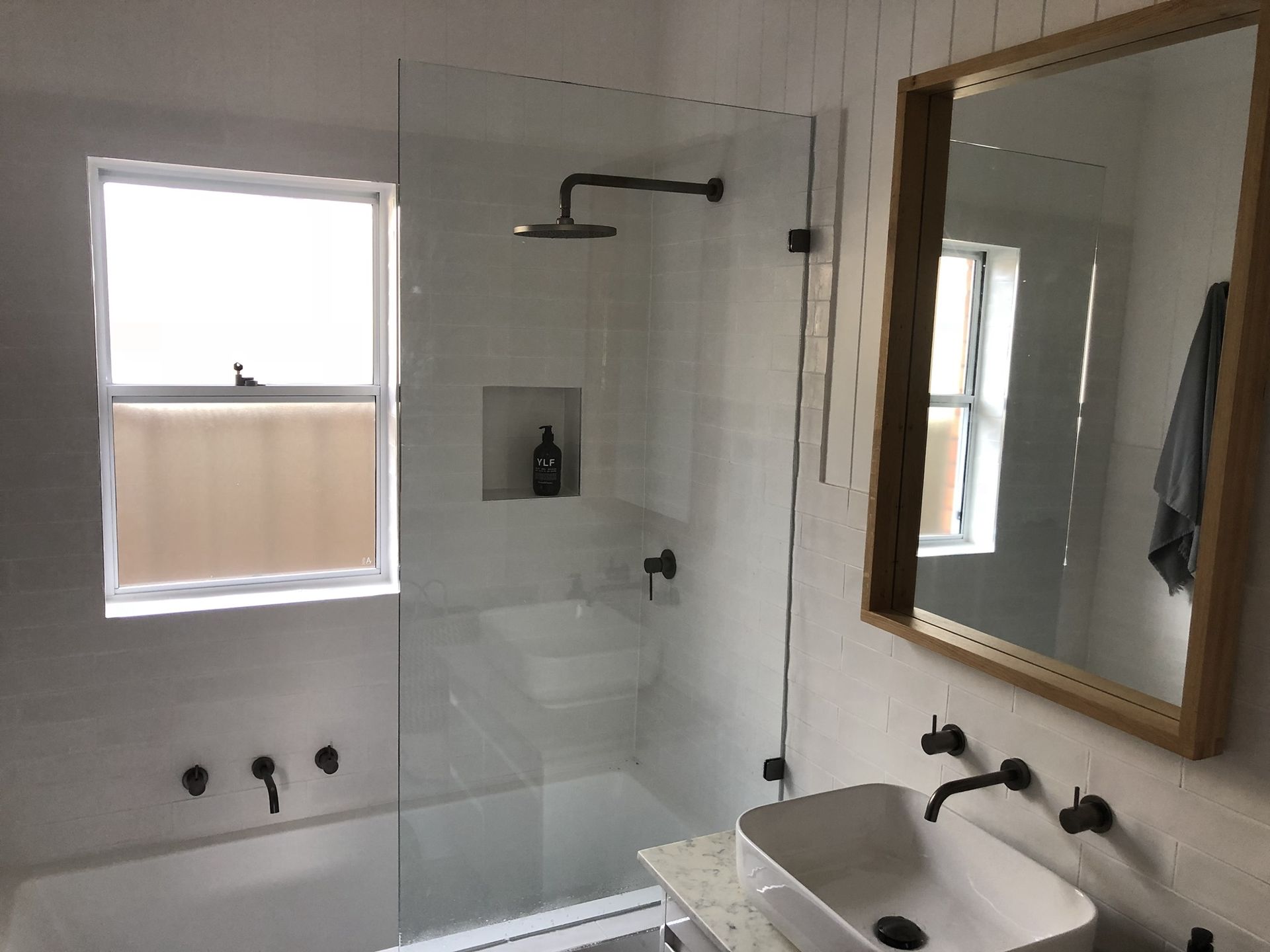 A Bathroom With A Mirror And Shower Screen — Bulli Glass in Shellharbour, NSW