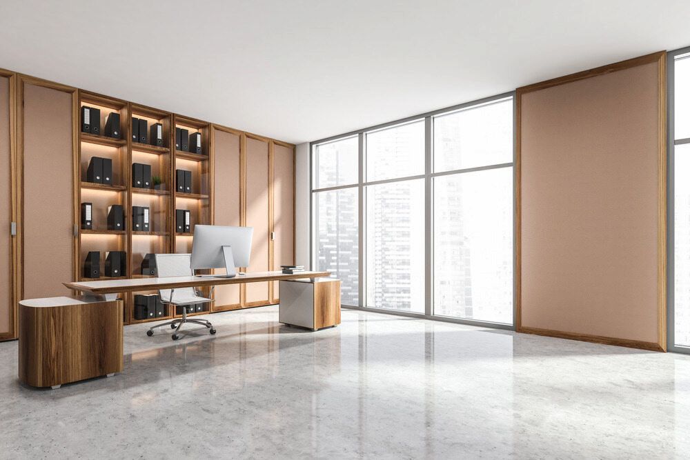 A Modern Office with a Desk, Chair, Computer and Shelves — Bulli Glass in Kiama, NSW